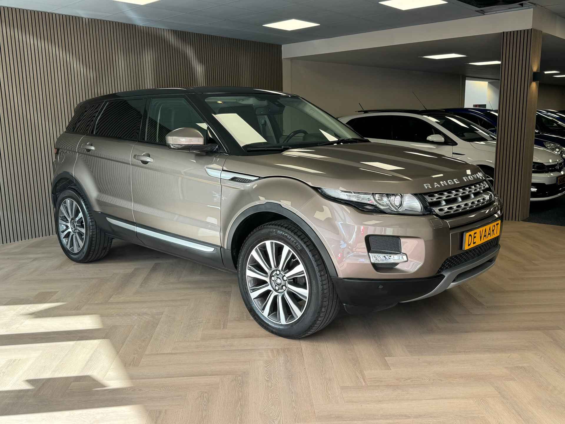 Land Rover Range Rover Evoque 2.0 Si 4WD Prestige AUT. PANORAMADAK AIRCO CRUISE LEDER NAVIGATIE CAMERA STOELVERWARMING - 4/40