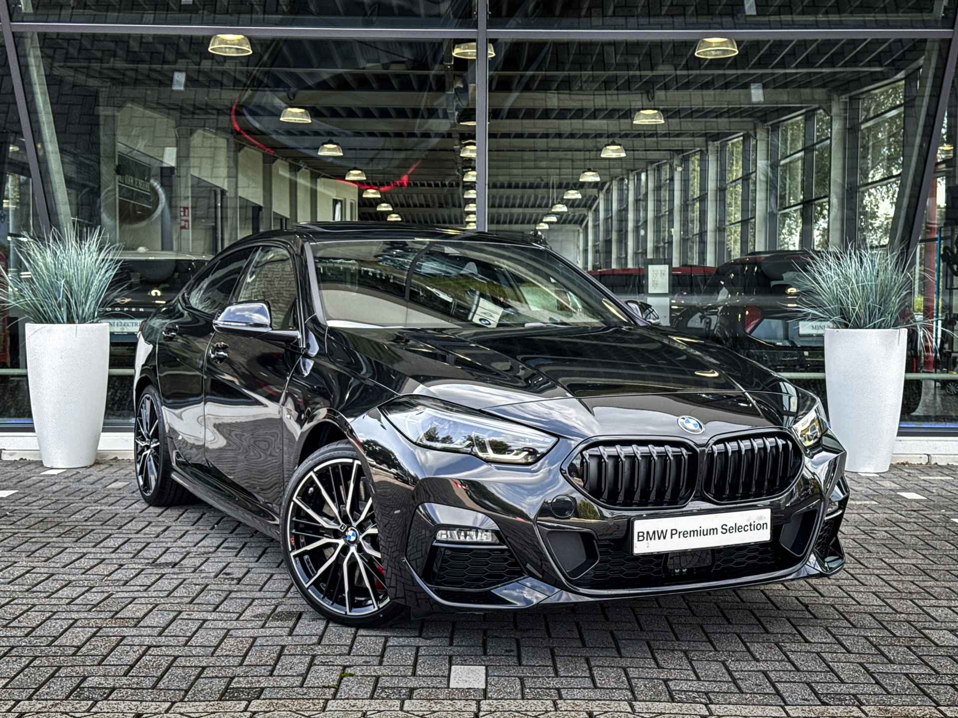 BMW 2 Serie Gran Coupé 218i High Executive M Sport Automaat / Panoramadak / Stoelverwarming / Adaptieve LED / Parking Assistant / Live Cockpit Professional / Cruise Control - 16/35