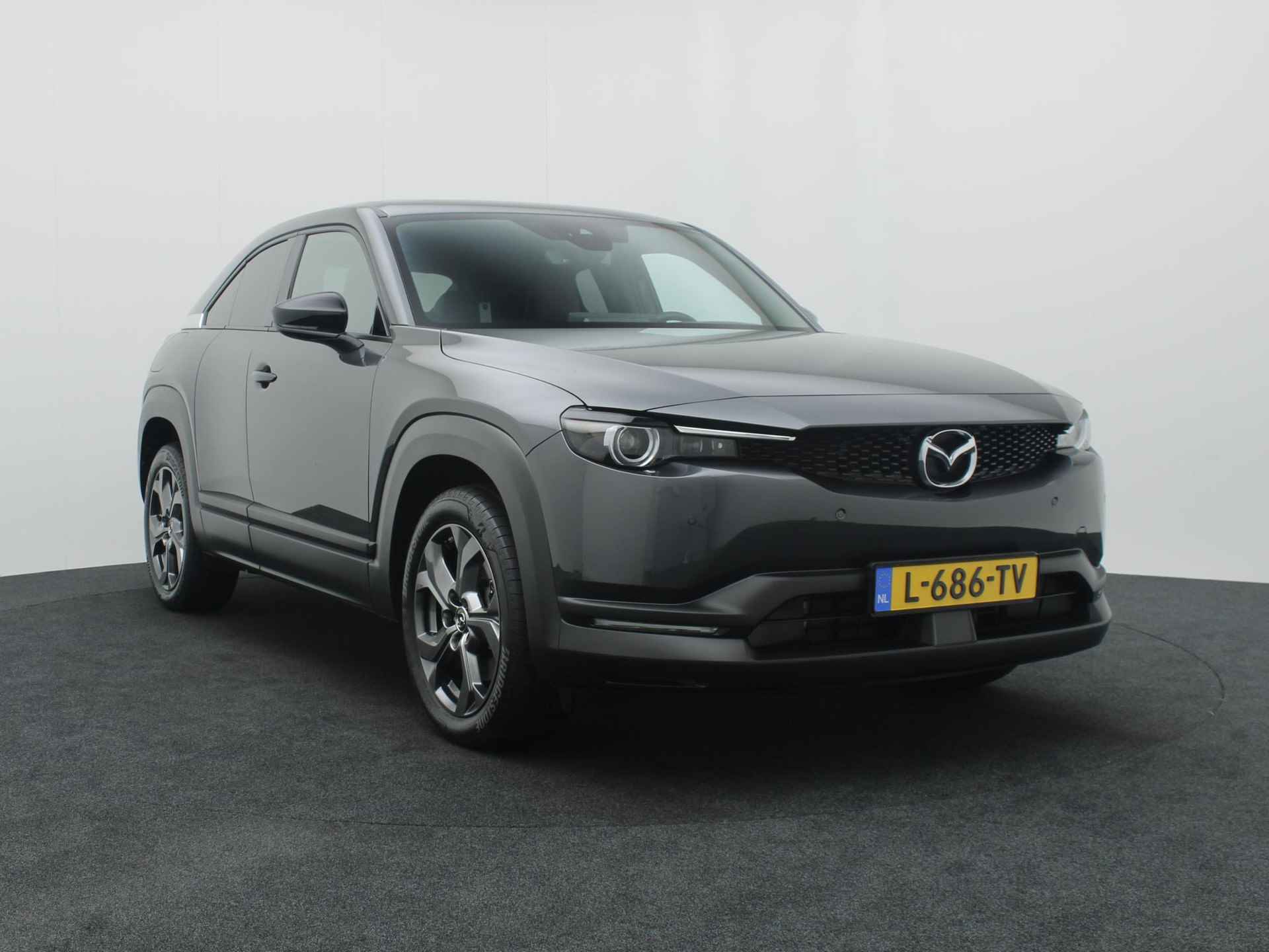 Mazda MX-30 e-SkyActiv EV Luxury : dealer onderhouden - 12% bijtelling tot 9-2026 | €2.000,- subsidie - 8/56