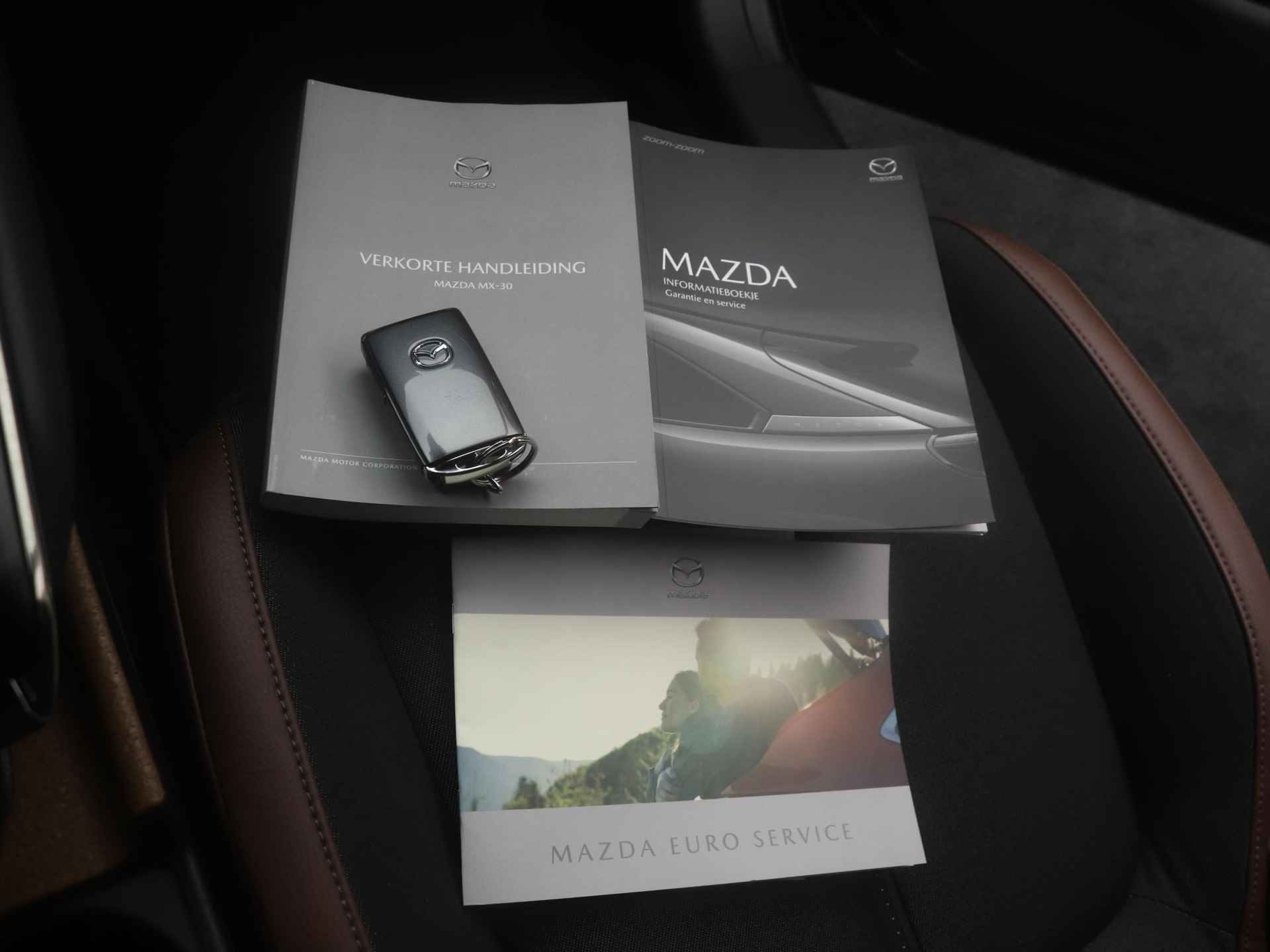 Mazda MX-30 e-SkyActiv EV Luxury : dealer onderhouden - 12% bijtelling tot 9-2026 | €2.000,- subsidie - 40/56
