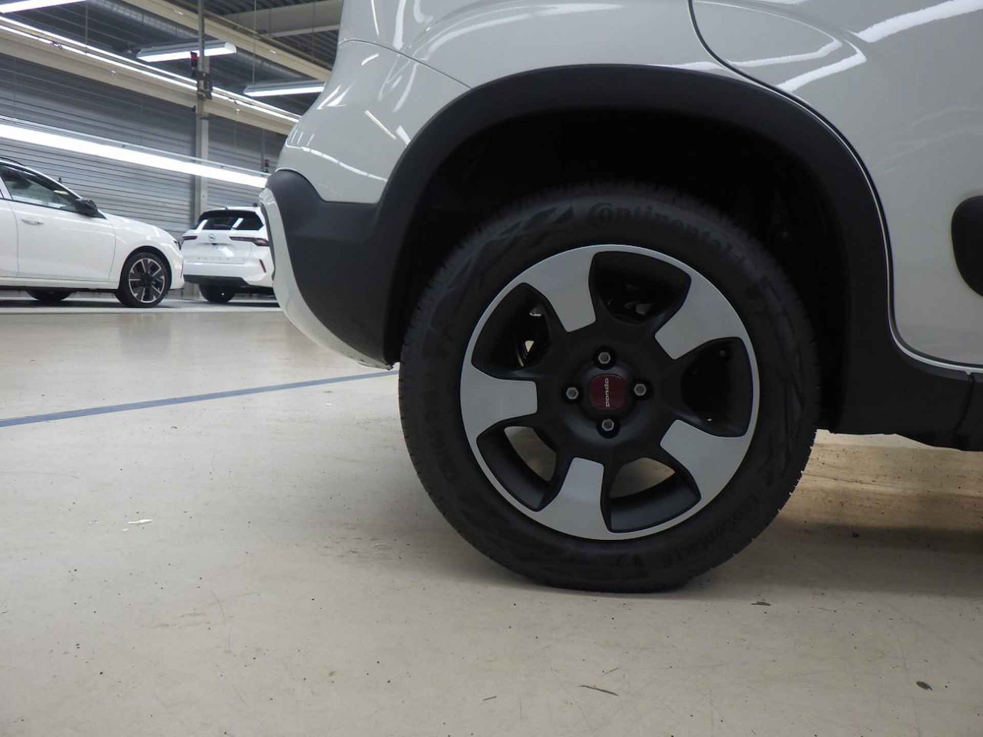 Fiat Panda 1.0 Hybrid Cross | Navigatie by App | Parkeersensoren | Licht & Regensensor | Airco | DAB+ | Getint Glas | Apple Carplay | Andro - 11/23