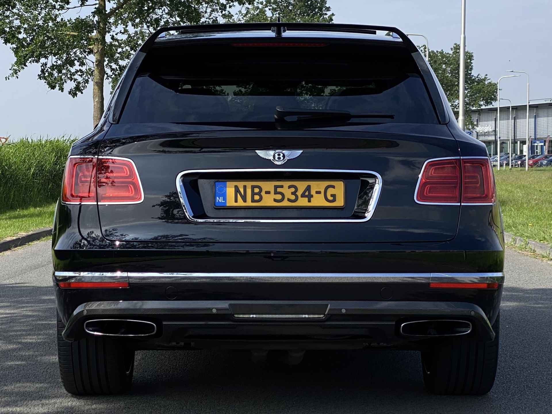 Bentley Bentayga 6.0 W12 | Nachtzicht | Adaptieve CruiseControl | 360 Camera | Panoramadak | 22” Lichtmetaal | Stuurwiel verwarmd | Elektrische zetels + Geheugen | NAIM Sound | Elektrische Trekhaak | Niveau Regeling | Carbon Pakket | NL Auto | - 8/97