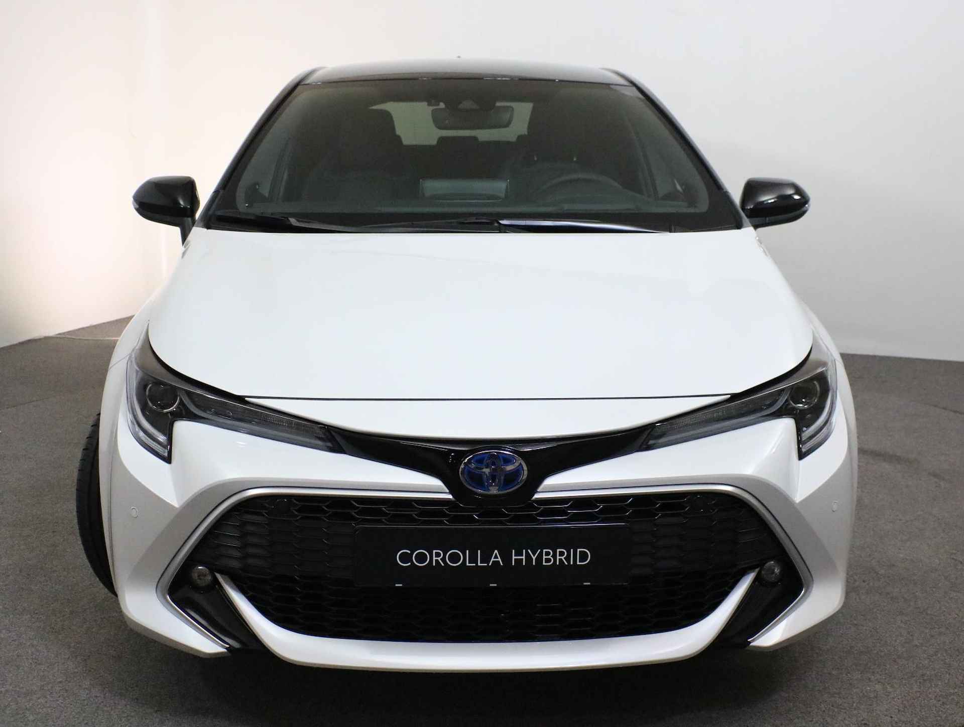 Toyota Corolla 1.8 Hybrid Executive | Bitone |Head Up | NAVI | Snel leverbaar | Inruilpremie 3000 euro | - 18/38