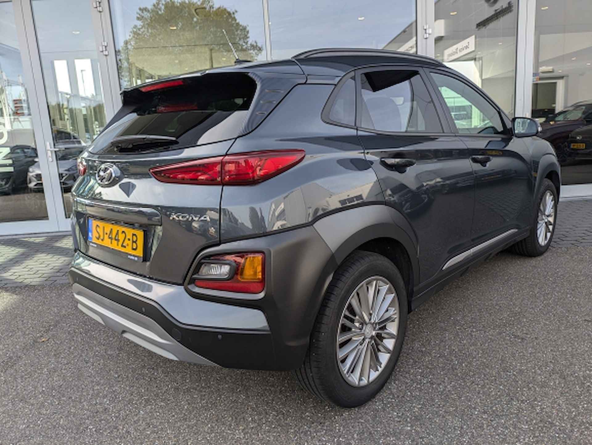 Hyundai Kona 1.0 T-GDI 120pk 2WD Fashion | Navigatie - 7/19