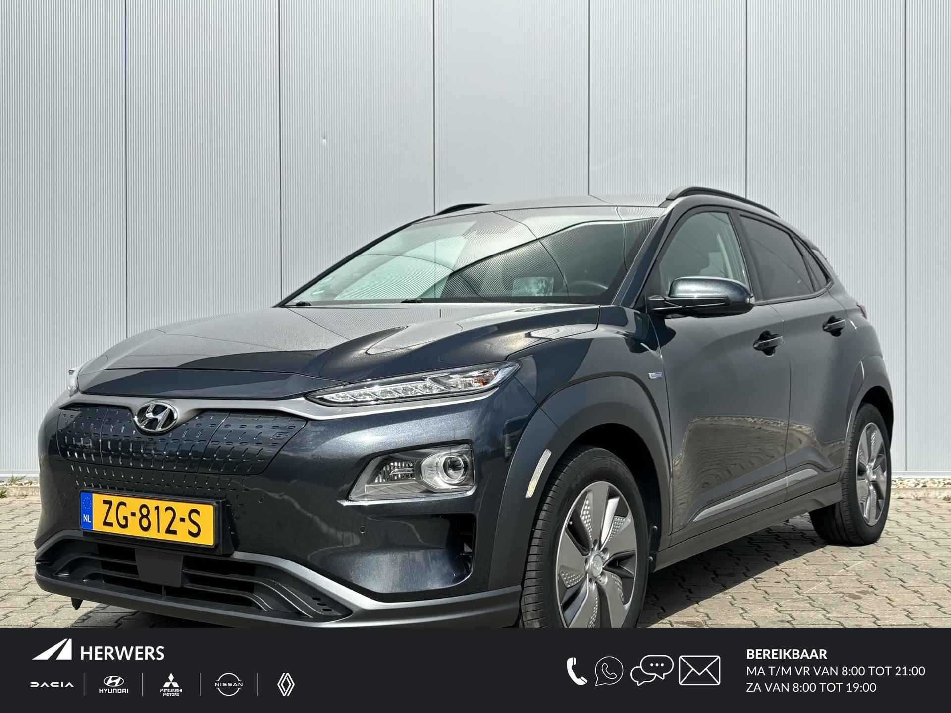 Hyundai Kona EV Premium 64 kWh / Electronic Climate Control / Apple Carplay & Android Auto / Navigatie / Lederen Bekleding / Automaat - 1/33