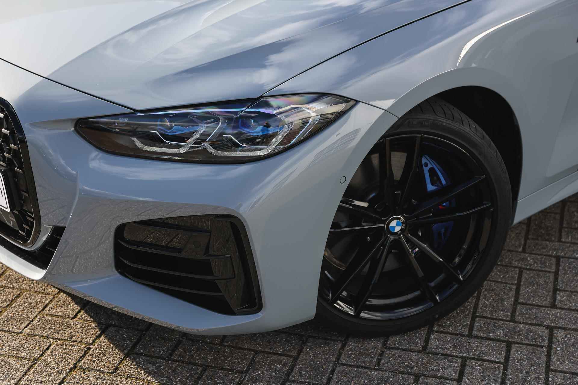 BMW 4 Serie Coupé M440i xDrive High Executive Automaat / Schuif-kanteldak / Laserlight / M Sportstoelen / Parking Assistant Plus / Driving Assistant Professional / Comfort Access / Harman Kardon - 35/41
