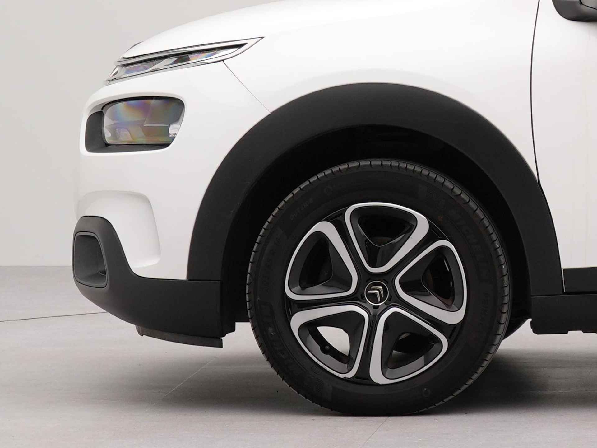 Citroën C4 Cactus 1.2 PureTech Feel | Navigatie by App | Airco | Bluetooth | Dab | Parkeersensoren achter | - 27/33