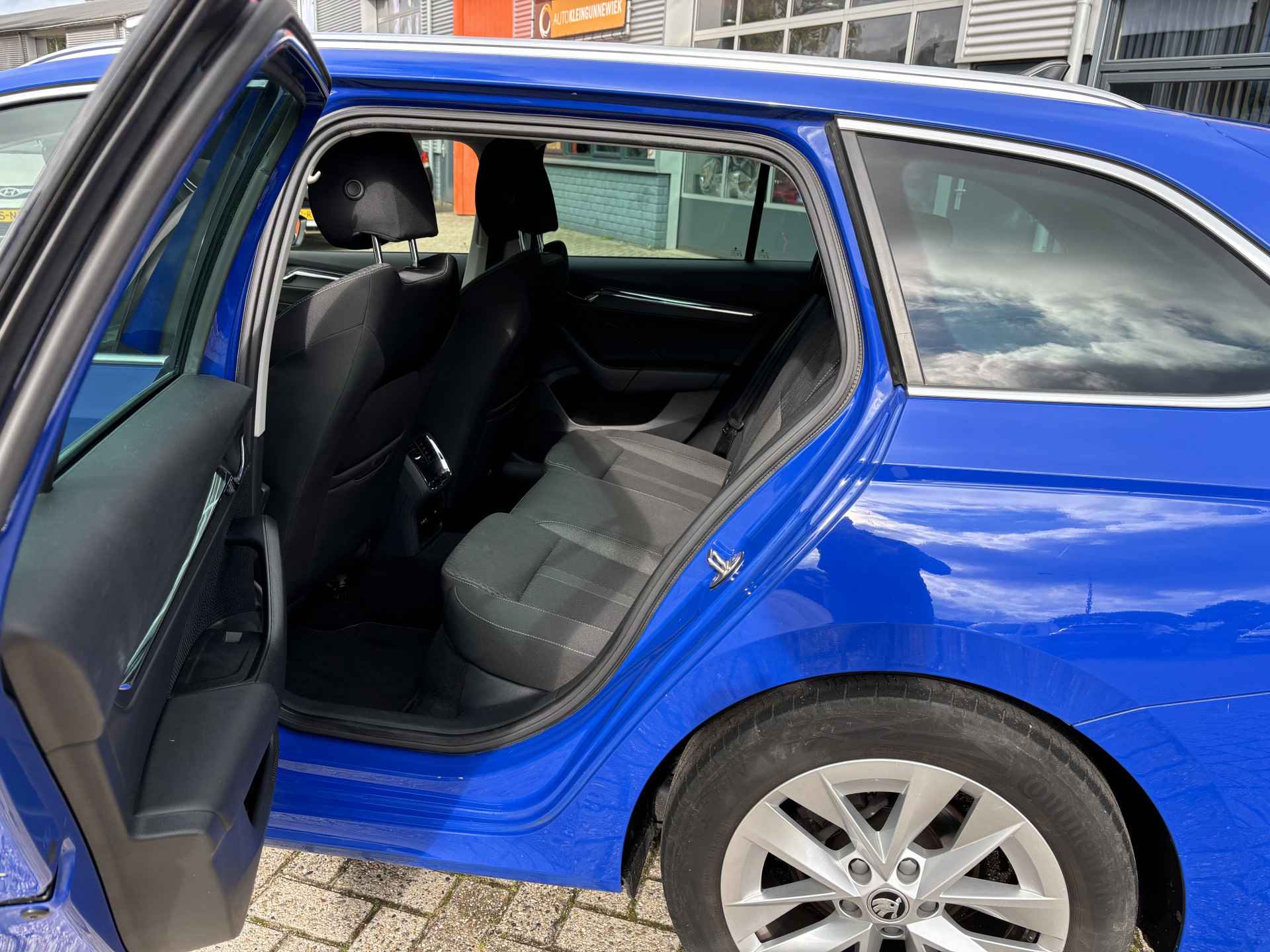 Škoda Octavia Combi 1.0 TSI Business Edition Plus NL-Auto 1e eigenaar / Apple/Android Carplay / Trekhaak / Digitaal Display / Parkeersensoren - 18/27