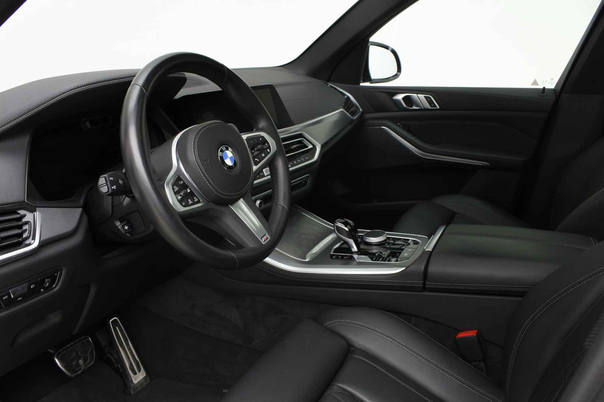 BMW X5 xDrive40i M-Sport | 3e zitrij | 7 zits | Panorama | 22" | Personal CoPilot - 18/34