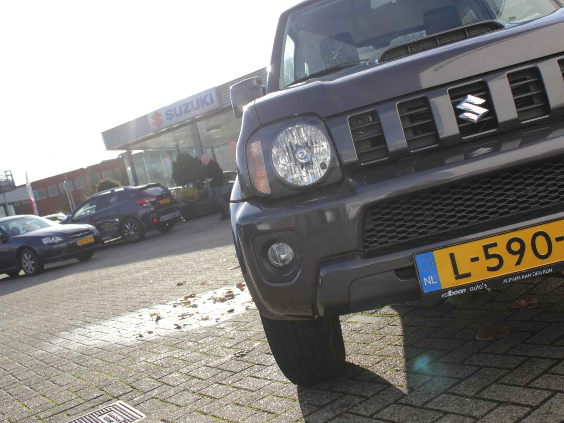 Suzuki Jimny 1.3 Exclusive Automaat | Airco | Trekhaak - 18/19