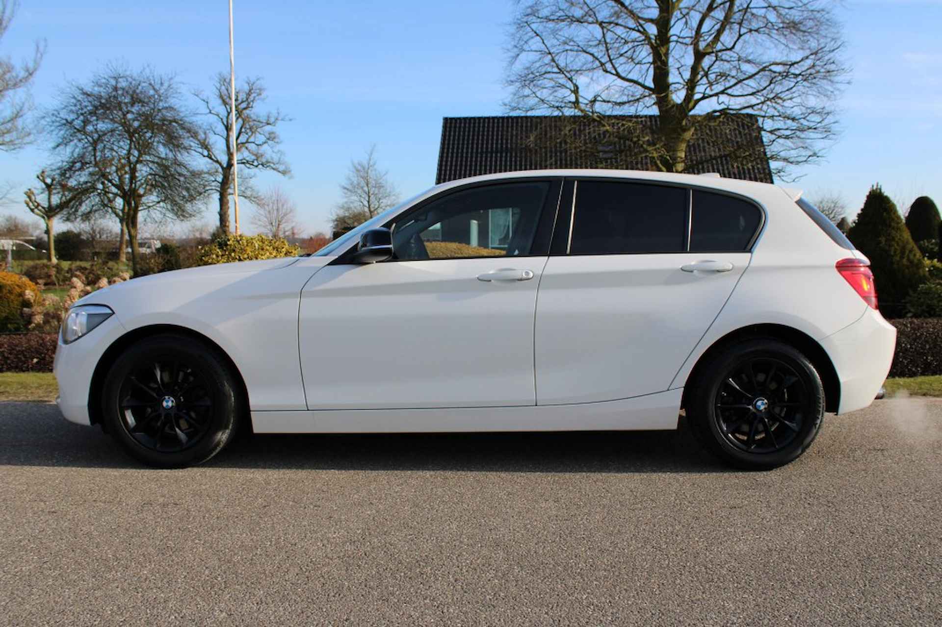 BMW 1-serie 116I 136pk Executive automaat ECC/Cruise/Navi PDC/Xenon/Trekhaak - 25/31