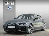 BMW i4 eDrive40 | High Executive / M Sportpakket Pro / Panodak / Driving Assistant Prof. / Harman Kardon / M Sportstoelen / Trekhaak / 20'' LMV