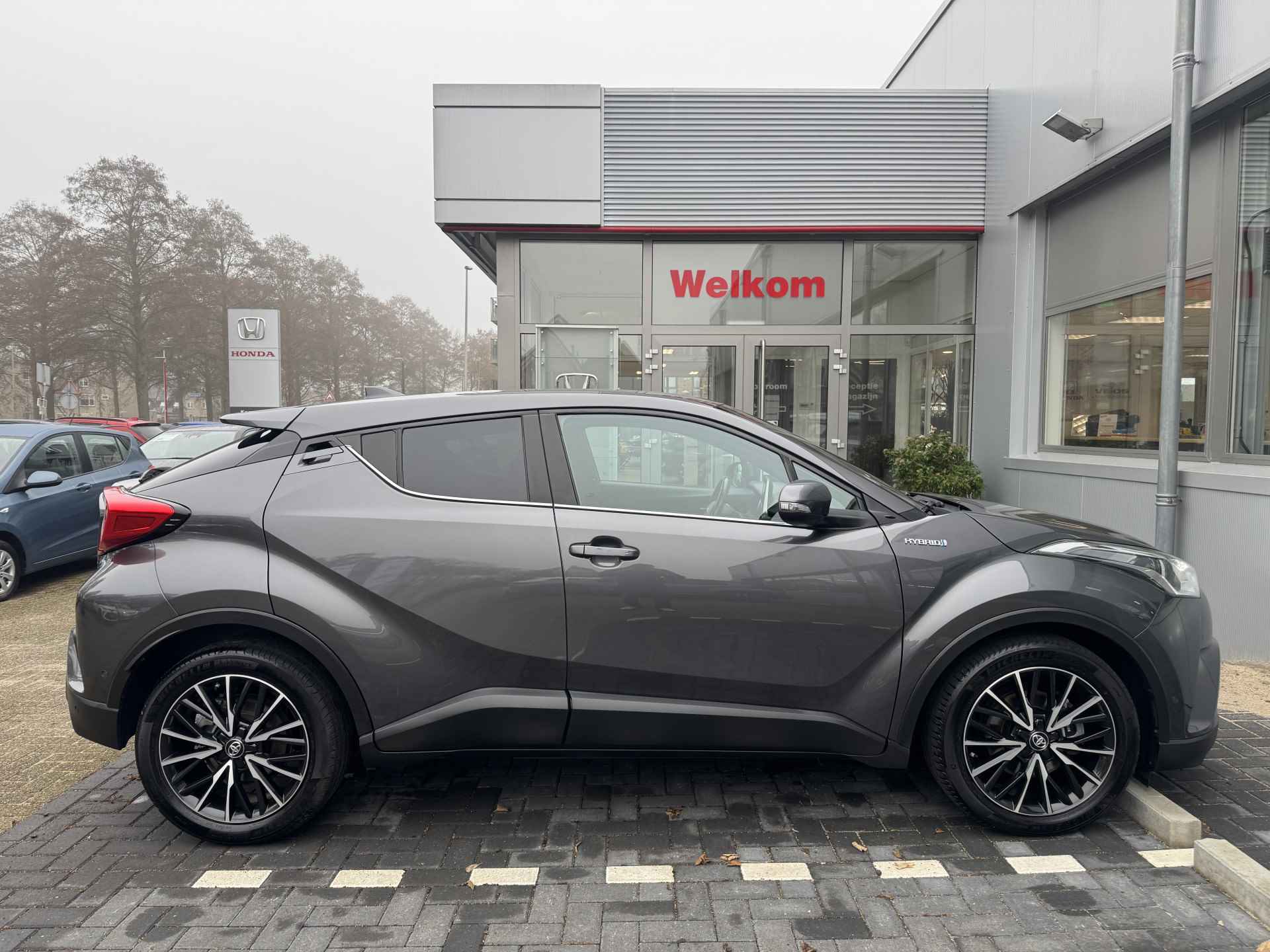 Toyota C-HR 1.8 Hybrid Dynamic Trekhaak, Navigatie, Stoelverwarming, Cruise control , All-in Rijklaarprijs - 38/41