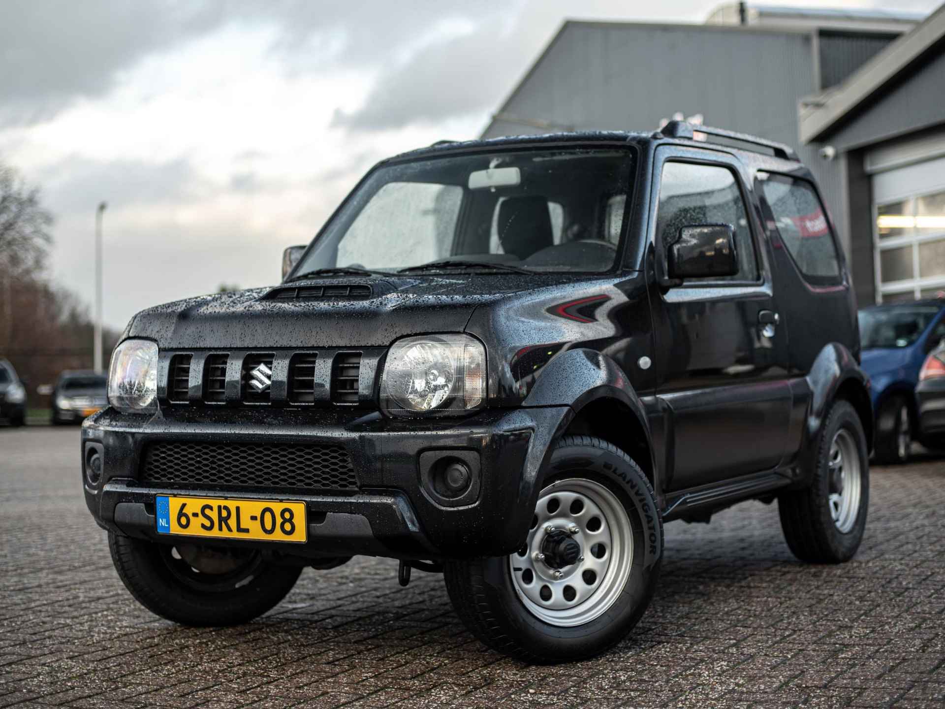 Suzuki Jimny 1.3 JLX 85pk 4x4 | Airco | Trekhaak - 2/13