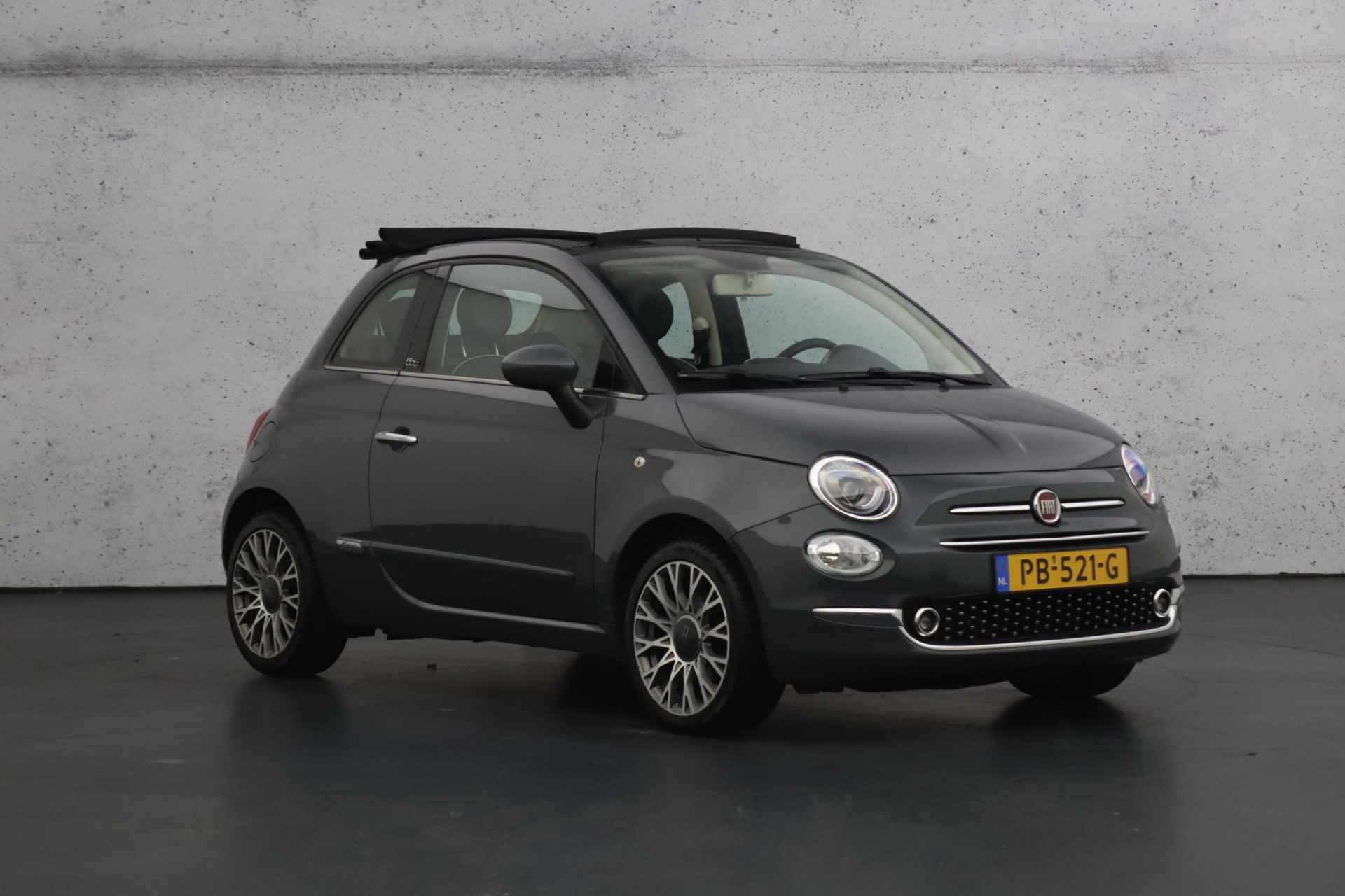 Fiat 500C 0.9 TwinAir Turbo Lounge | Elektrisch bedienbaar open dak | Airconditioning | Navigatie - 9/28