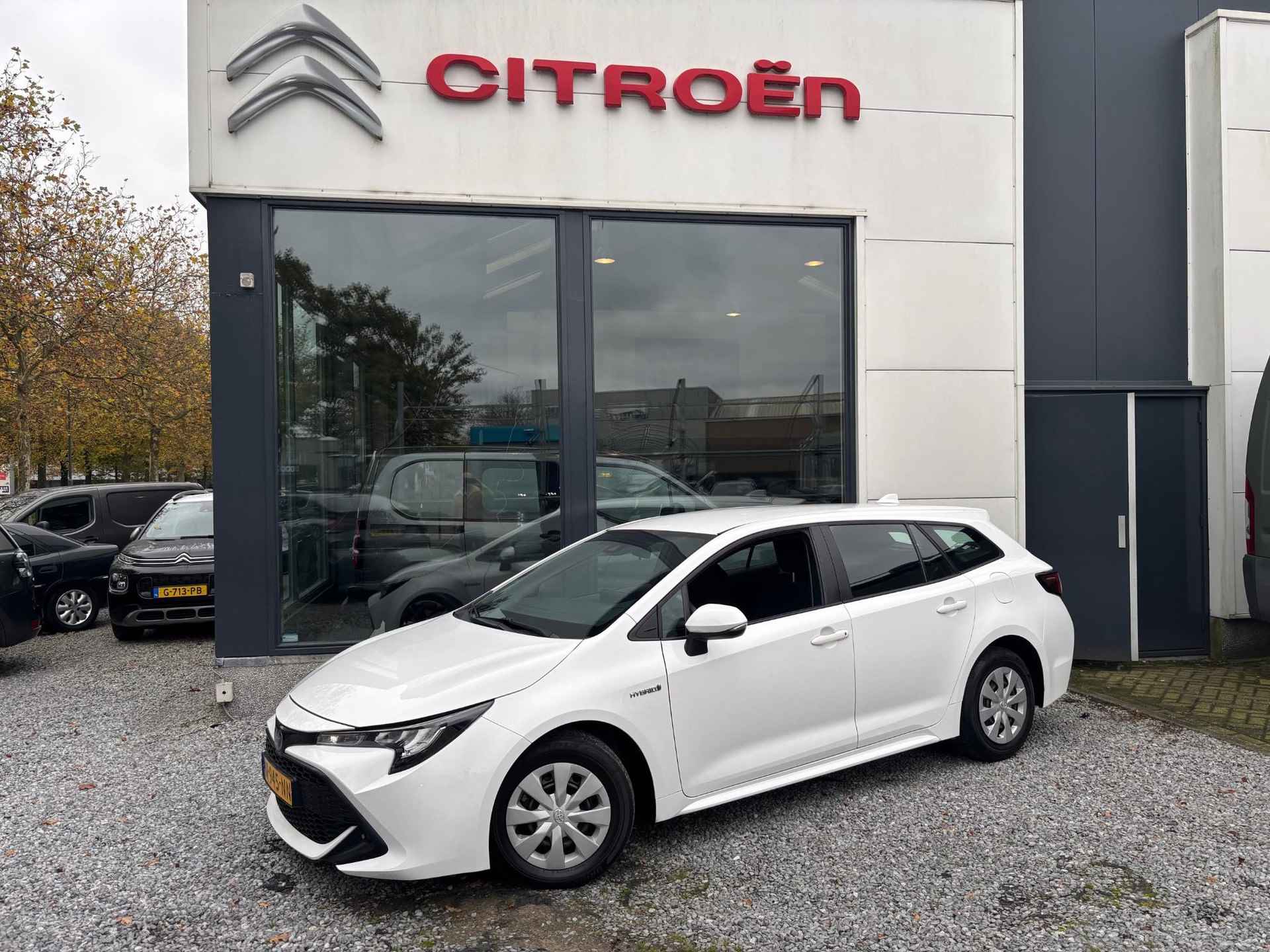 Toyota Corolla Touring Sports 1.8 Hybrid Comfort | Rijklaar geleverd met 12 maanden BOVAG garantie! | - 2/17