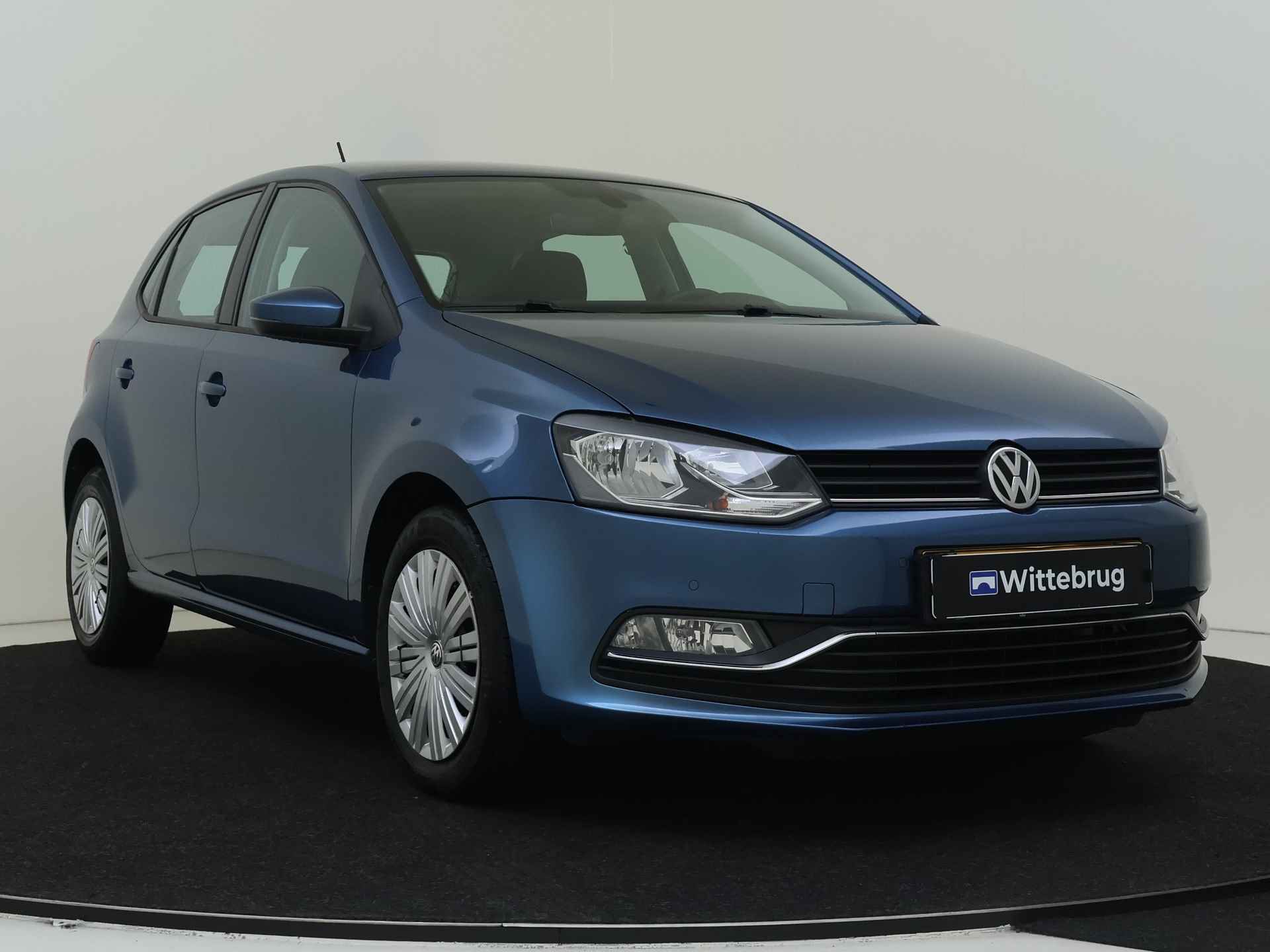 Volkswagen Polo 1.2 TSI Comfortline 5 deurs Automaat | Navigatie | Climate Control | Trekhaak - 4/28