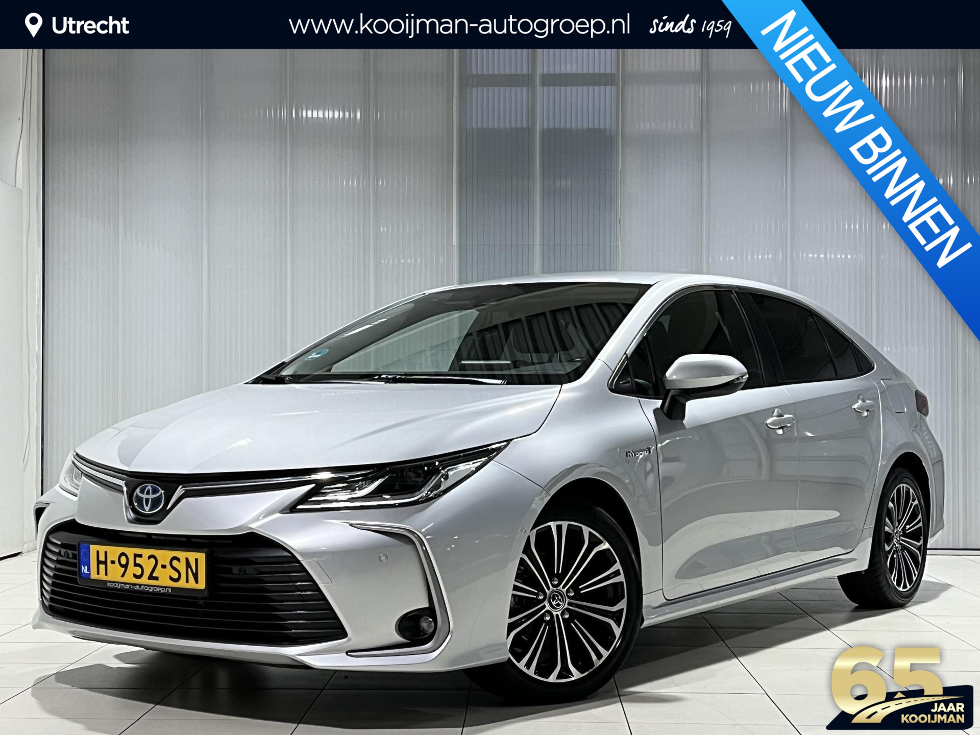 Toyota Corolla 1.8 Hybrid Style | 1e eigenaar | 100% onderhouden | Parkeerassistent | Stoelverwarming | Navigatie