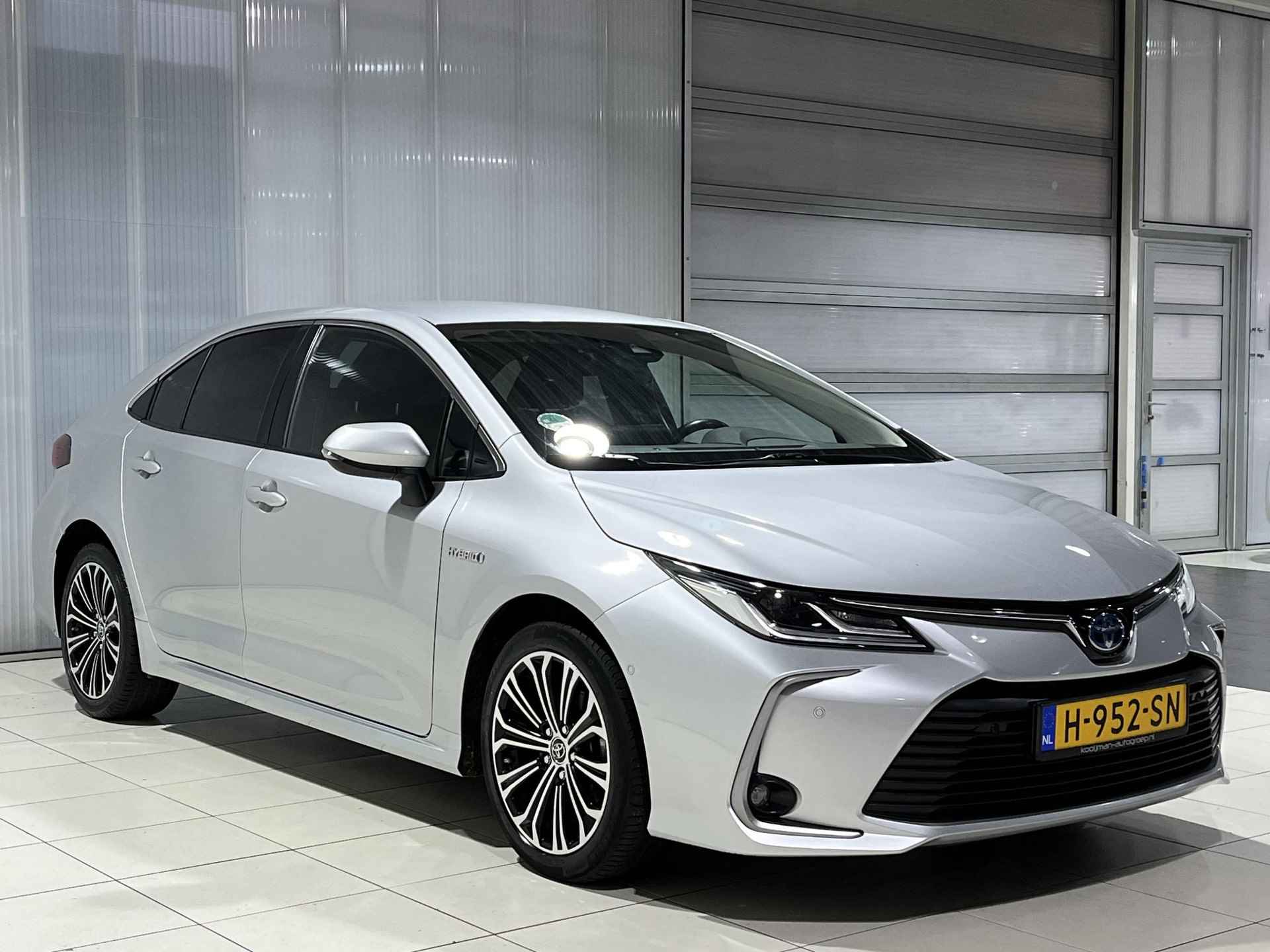 Toyota Corolla 1.8 Hybrid Style | 1e eigenaar | 100% onderhouden | Parkeerassistent | Stoelverwarming | Navigatie - 5/41