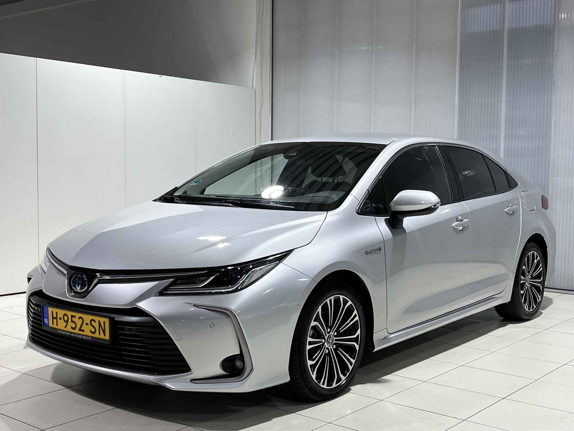 Toyota Corolla 1.8 Hybrid Style | 1e eigenaar | 100% onderhouden | Parkeerassistent | Stoelverwarming | Navigatie - 7/41