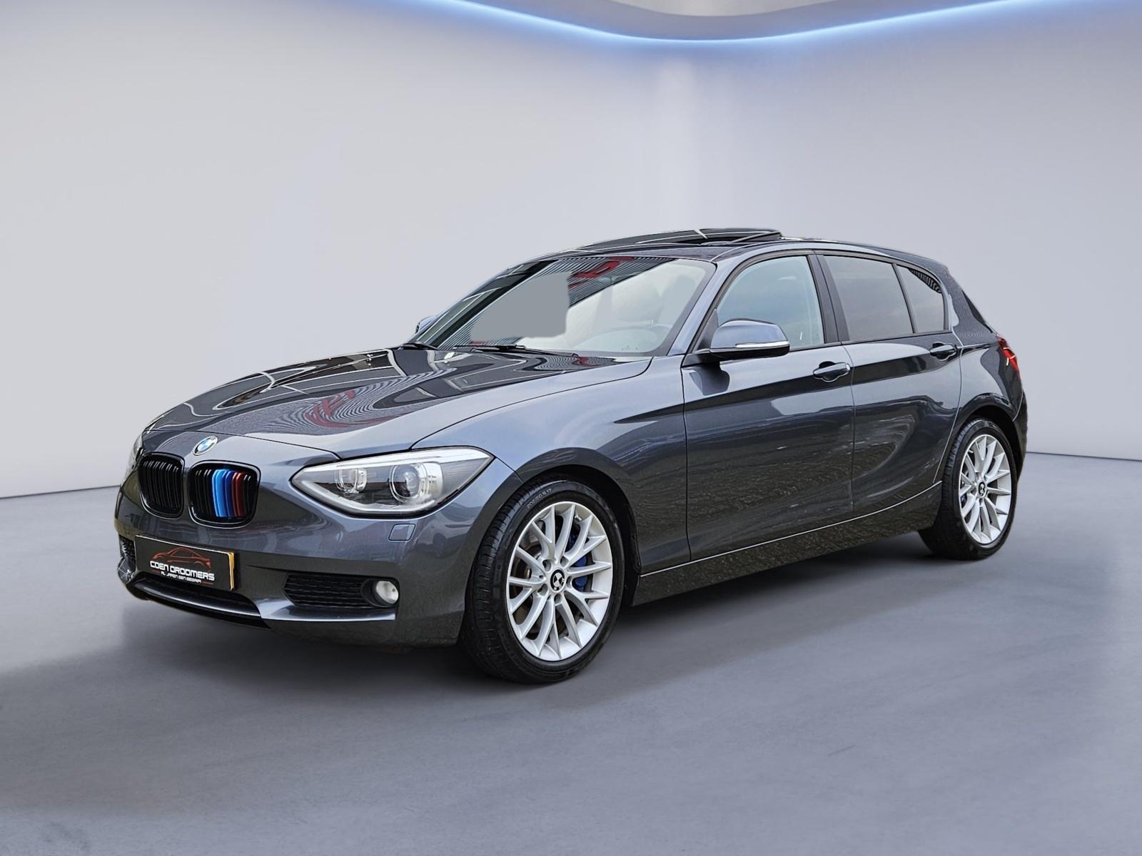 BMW 1-serie 125i Apple Carplay/Elektrisch schuifdak/M-Sport remklauwen/Sportstoelen/Xenon/Stoelverwarming/Cruise&Clima control/ (MET GARANTIE*)