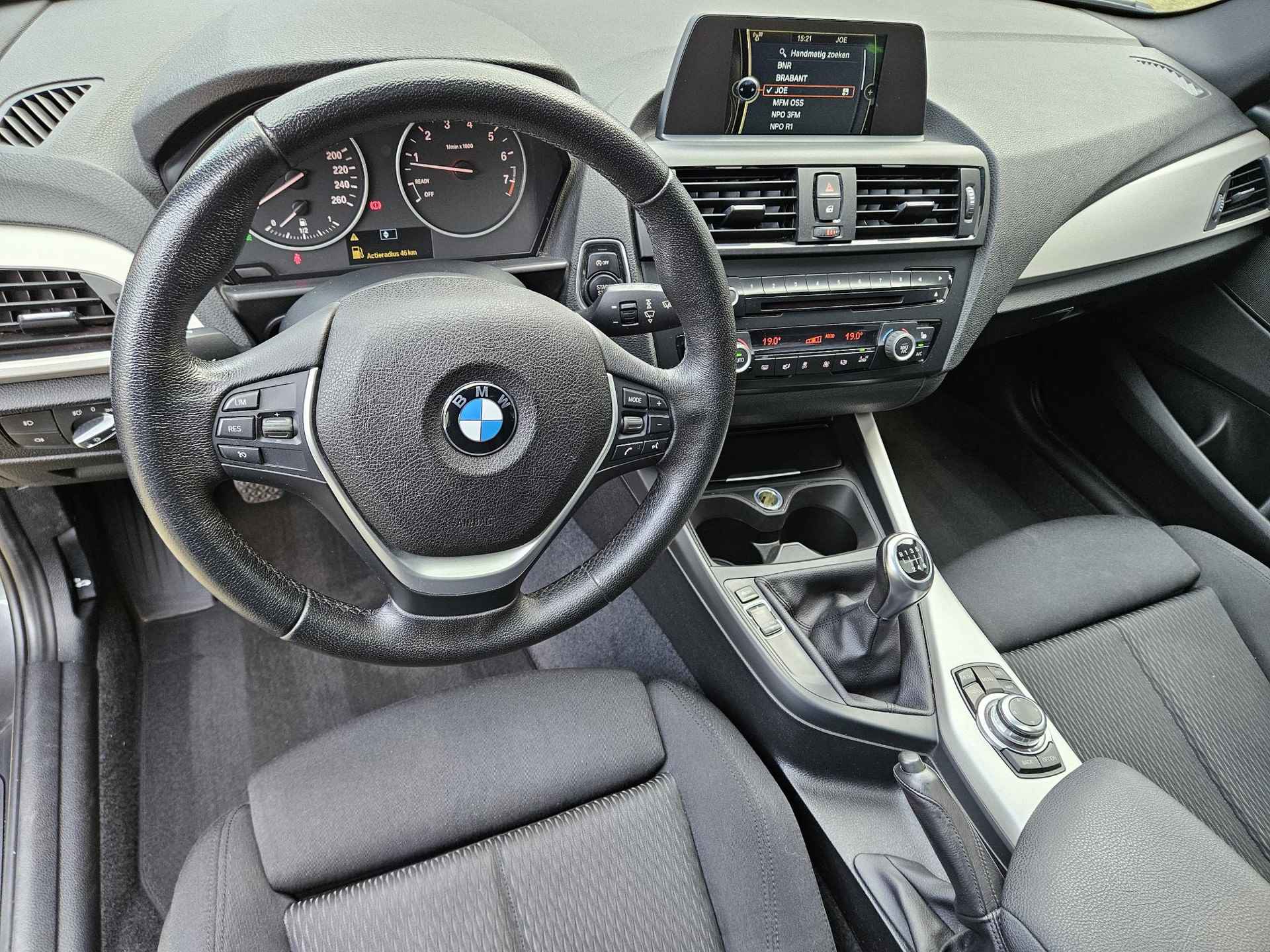 BMW 1-serie 125i Apple Carplay/Elektrisch schuifdak/M-Sport remklauwen/Sportstoelen/Xenon/Stoelverwarming/Cruise&Clima control/ (MET GARANTIE*) - 10/37