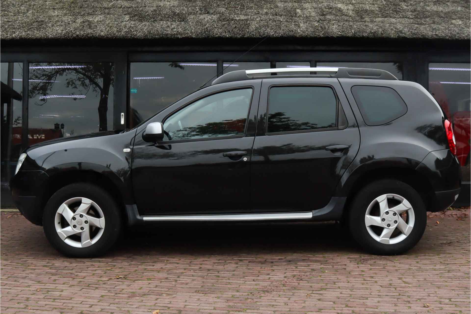 Dacia Duster 1.6 Lauréate 2wd | Trekhaak | Lichtmetalen velgen | Airco - 6/23