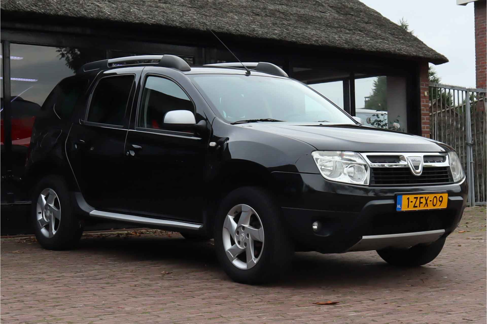 Dacia Duster 1.6 Lauréate 2wd | Trekhaak | Lichtmetalen velgen | Airco - 12/23