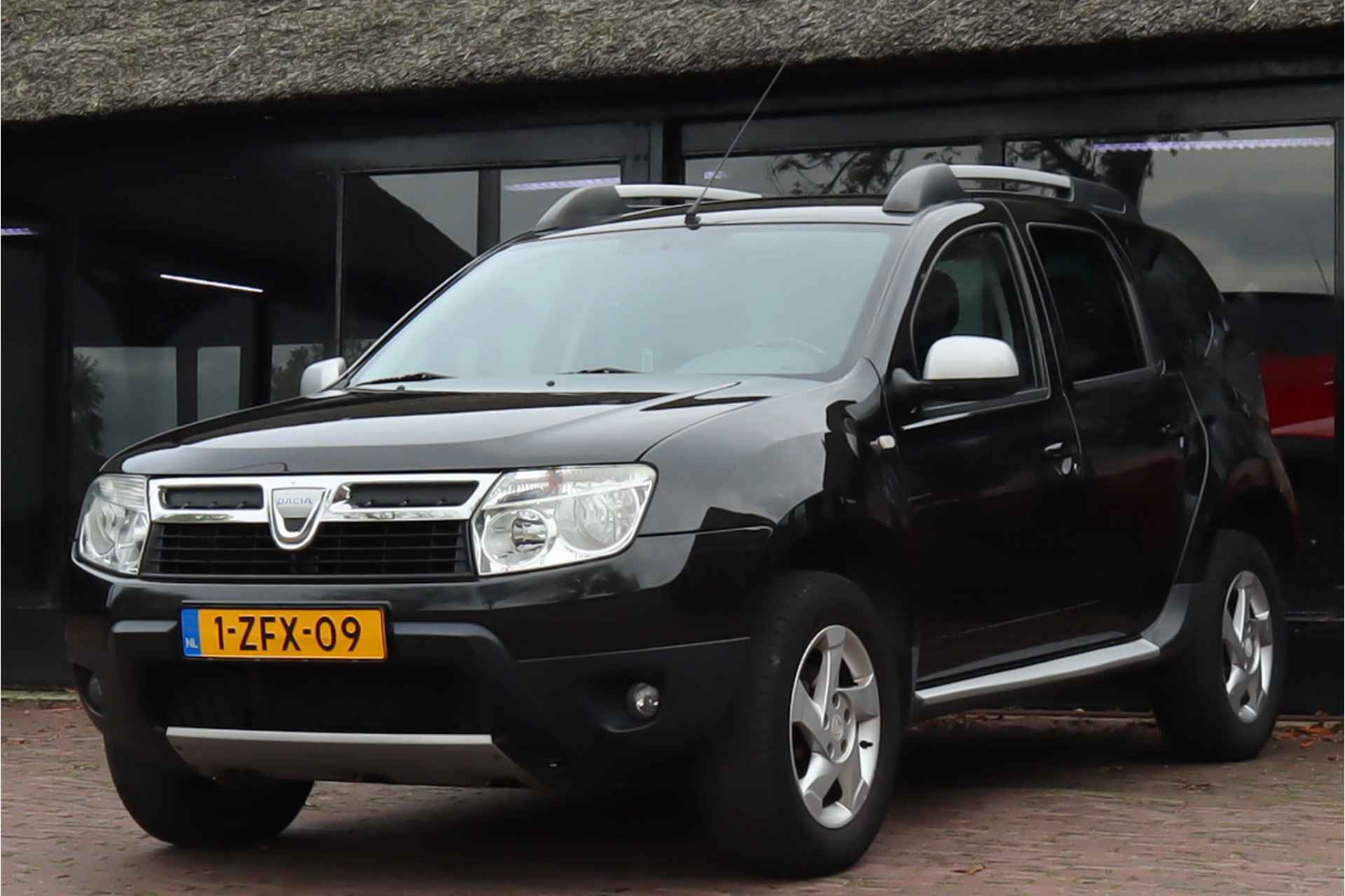 Dacia Duster 1.6 Lauréate 2wd | Trekhaak | Lichtmetalen velgen | Airco - 22/23