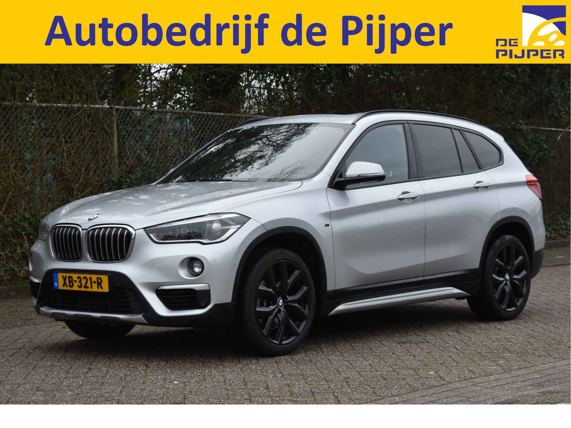 BMW X1 sDrive20i Orange Edition II Open dak |  Cruise control | Navi |  Trekhaak |