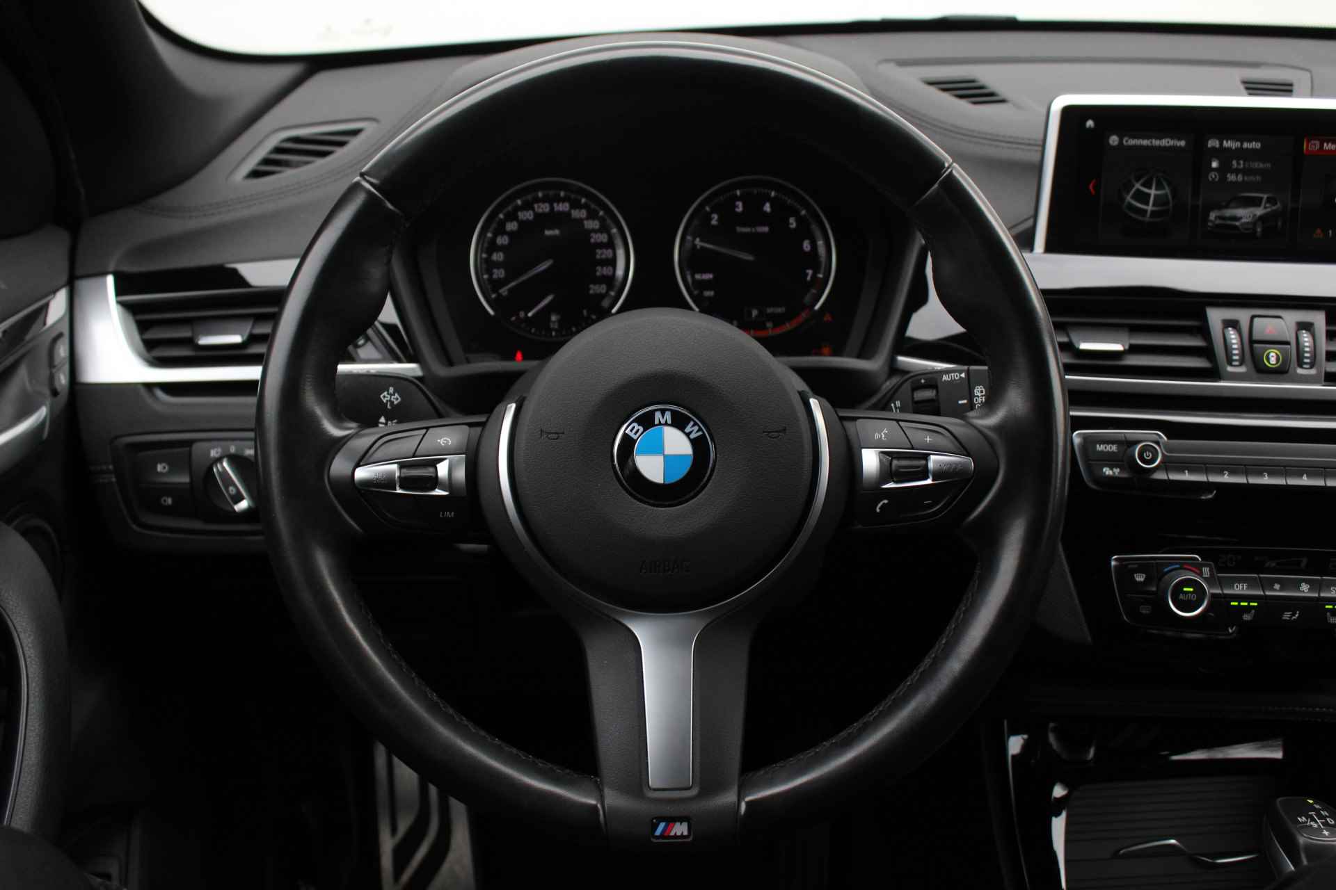 BMW X1 xDrive25e M Sport Automaat / Trekhaak / Sportstoelen / LED / Stoelverwarming / PDC achter / Navigatie / Cruise Control - 27/32