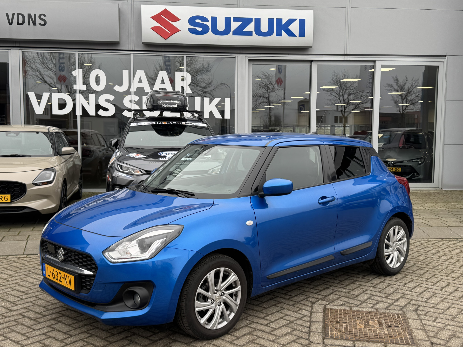 Suzuki Swift 1.2 Select Smart Hybrid Fabrieksgarantie ! | Nederlandse Auto ! | 12.087 km !   Automaat | DodeHoek detectie | Navi | Camera | Stoelverwarming | Lane Assist | Parkeersensoren | android apple Carplay   INFO;F.Bogaars