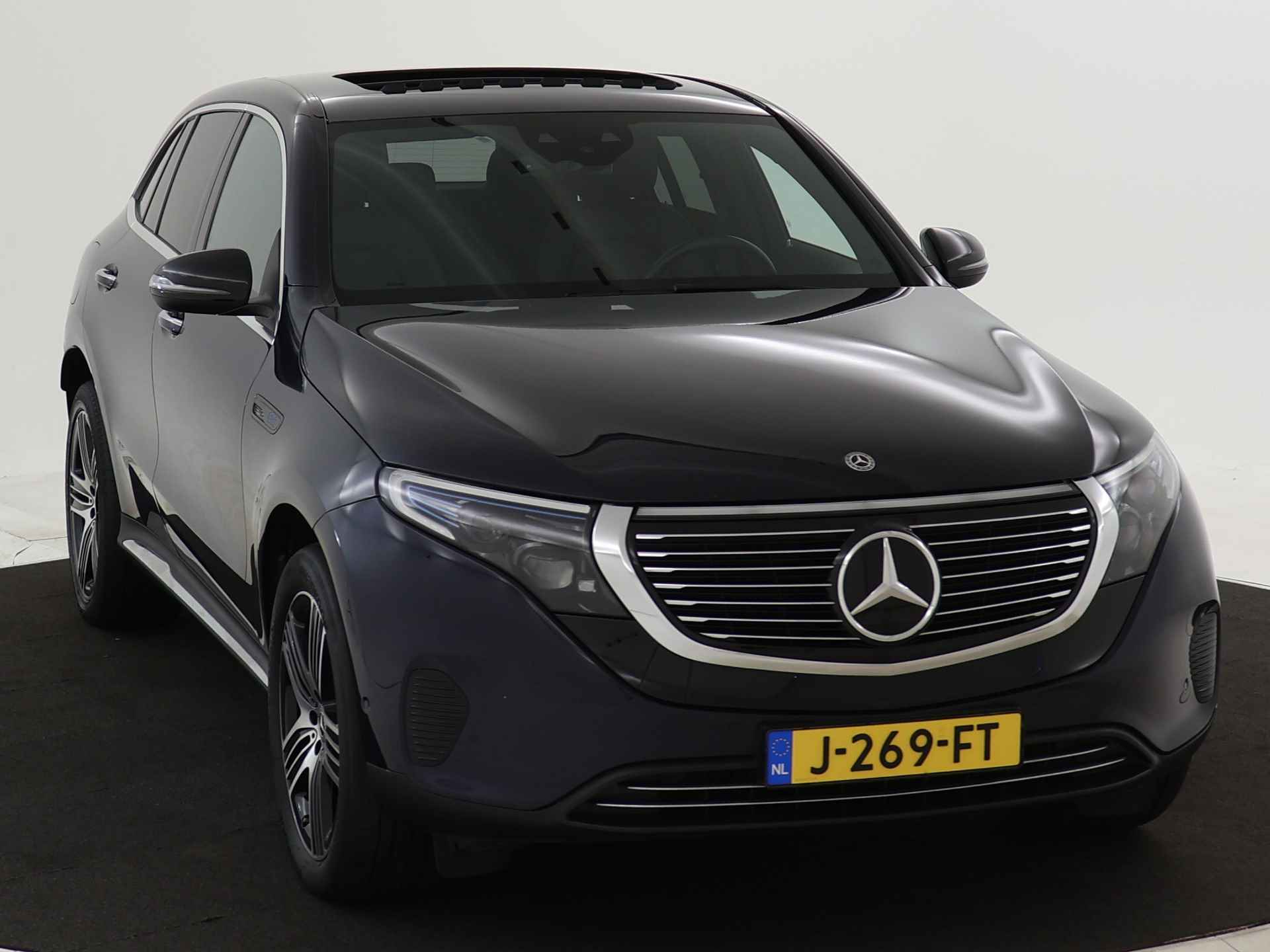 Mercedes-Benz EQC 400 4MATIC Business Solution Luxury 80 kWh | Lichtmetalen velgen | Schuif/kanteldak | Navigatie | Parking support | Lederen bekleding | Inclusief 24 maanden MB Certified garantie voor europa | - 24/39