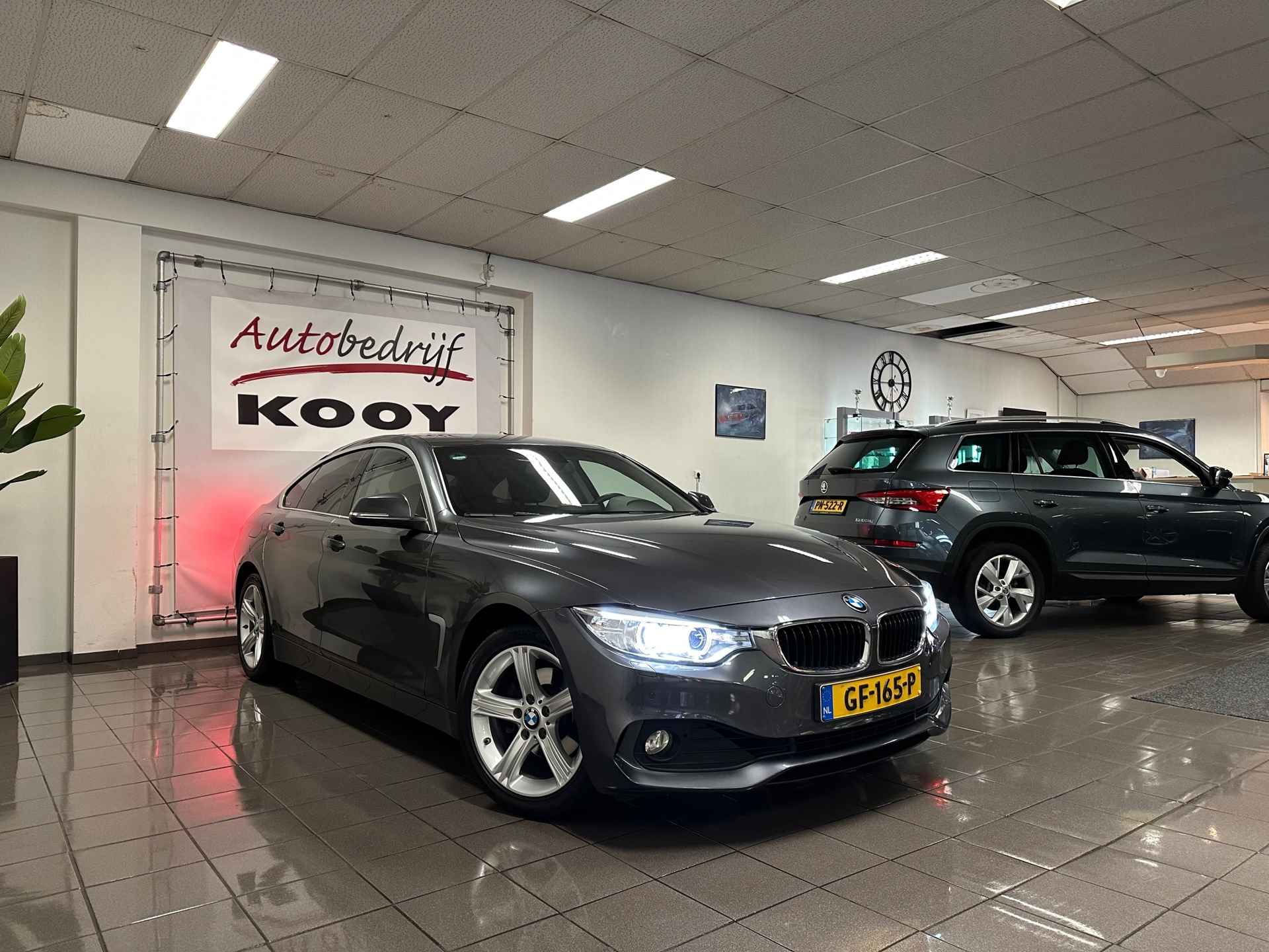 BMW 4-serie Gran Coupé 420i Executive * Automaat / Navigatie / Trekhaak / Xenon / NL Auto * - 9/24