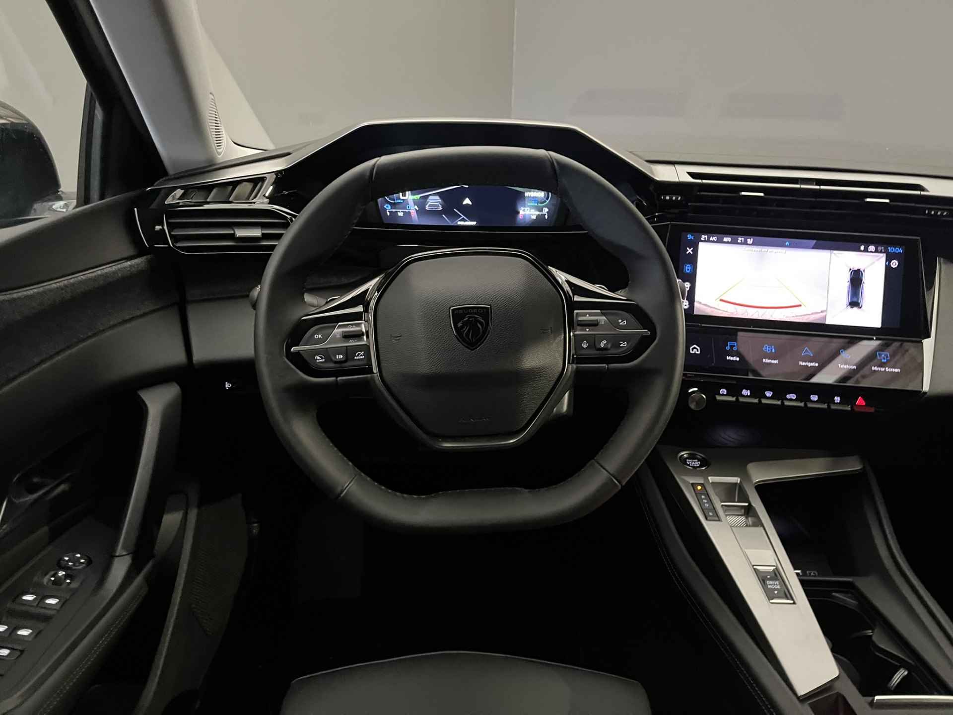 Peugeot 408 1.6 HYbrid Allure Pack 180PK EAT8 | Camera | Elektrische stoel | Stoelverwarming | Keyless | Leder/Stof | 19'' Lichtmetaal | Cruise | Clima | LED | Carplay | Navigatie | - 30/31