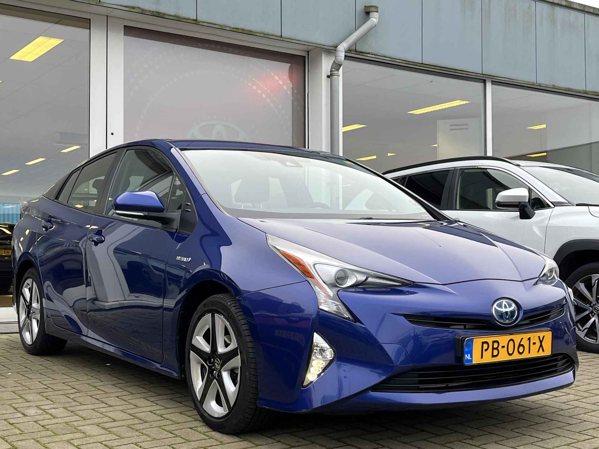 Toyota Prius 1.8 First Edition | 1e Eigenaar | Trekhaak | BlindSpot | Stoelverwarming | HUD | Navigatie | 10 Jaar Garantie | Nederlandse Auto | - 5/35