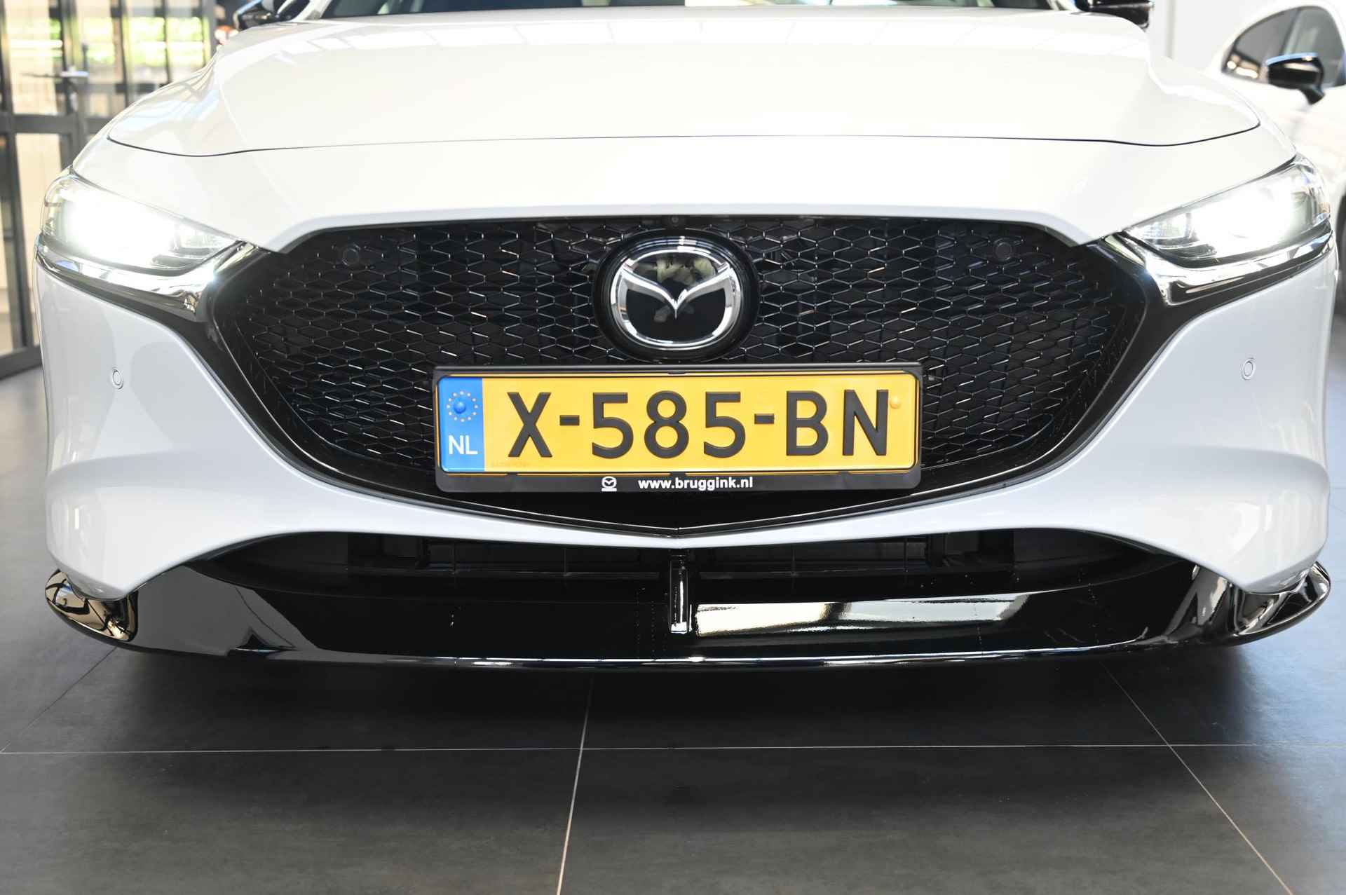 Mazda 3 e-SkyActiv-X 186 6MT Exclusive-line met alle pakketten inclusief sunroof en accessoire pakket *Demovoordeel* - 12/73