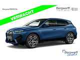 BMW iX xDrive50 - Luchtvering - Integral Active Steering - Pano - Trekhaak - Driving Ass Prof