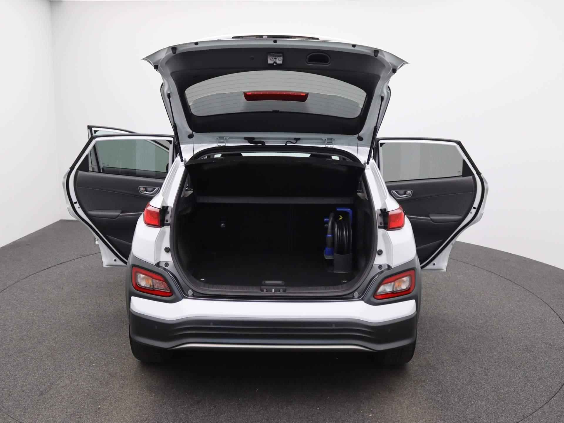 Hyundai Kona EV Premium 64 kWh | Camera | Cruise Control | Navigatie | Stoelverwarming - 13/48