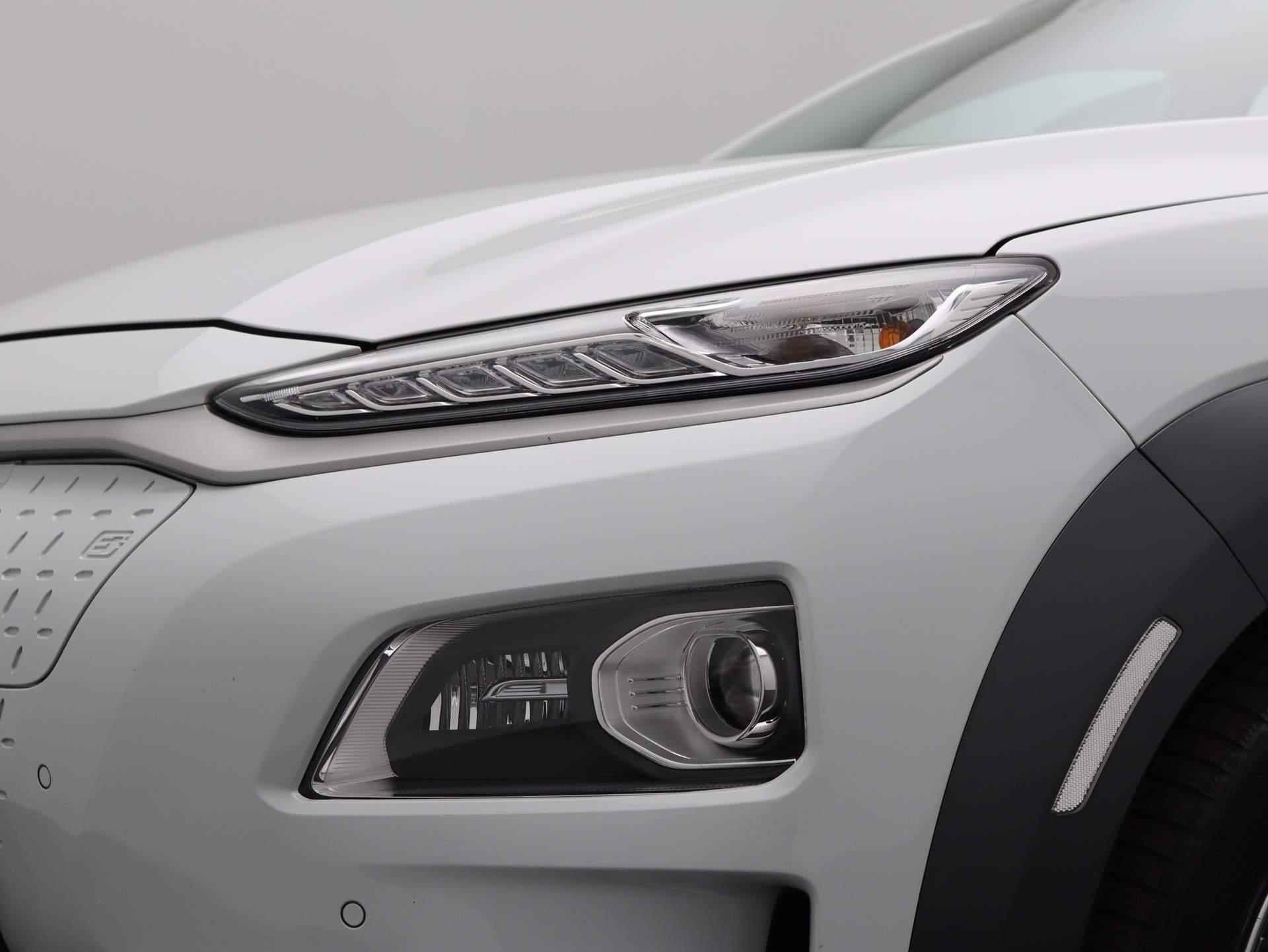 Hyundai Kona EV Premium 64 kWh | Camera | Cruise Control | Navigatie | Stoelverwarming - 14/48