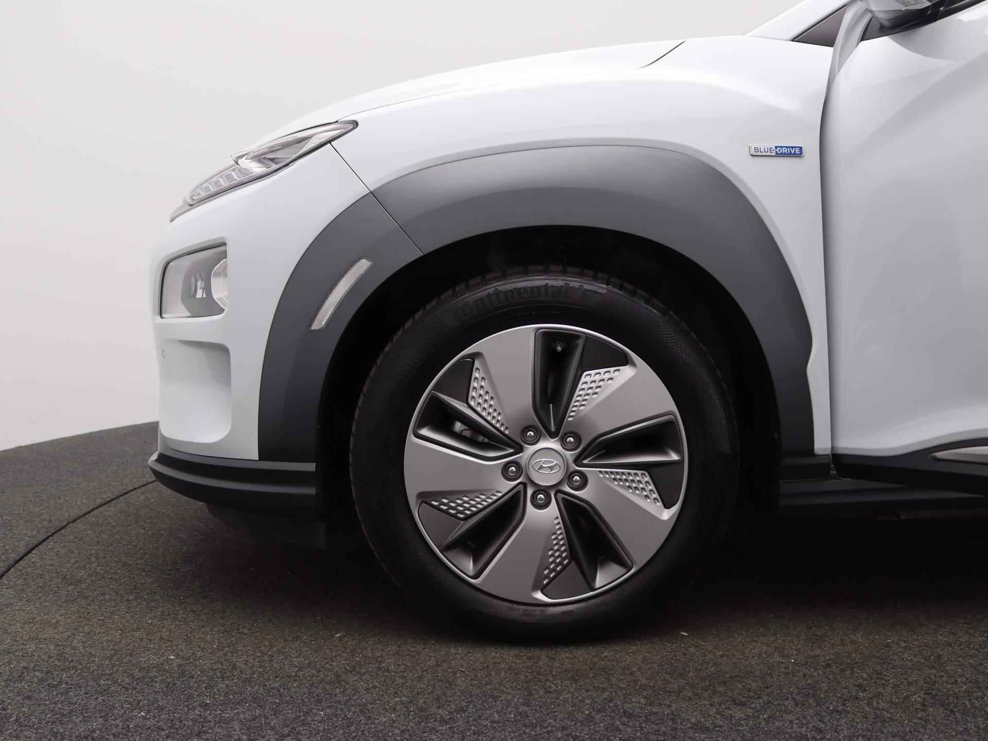 Hyundai Kona EV Premium 64 kWh | Camera | Cruise Control | Navigatie | Stoelverwarming - 15/48