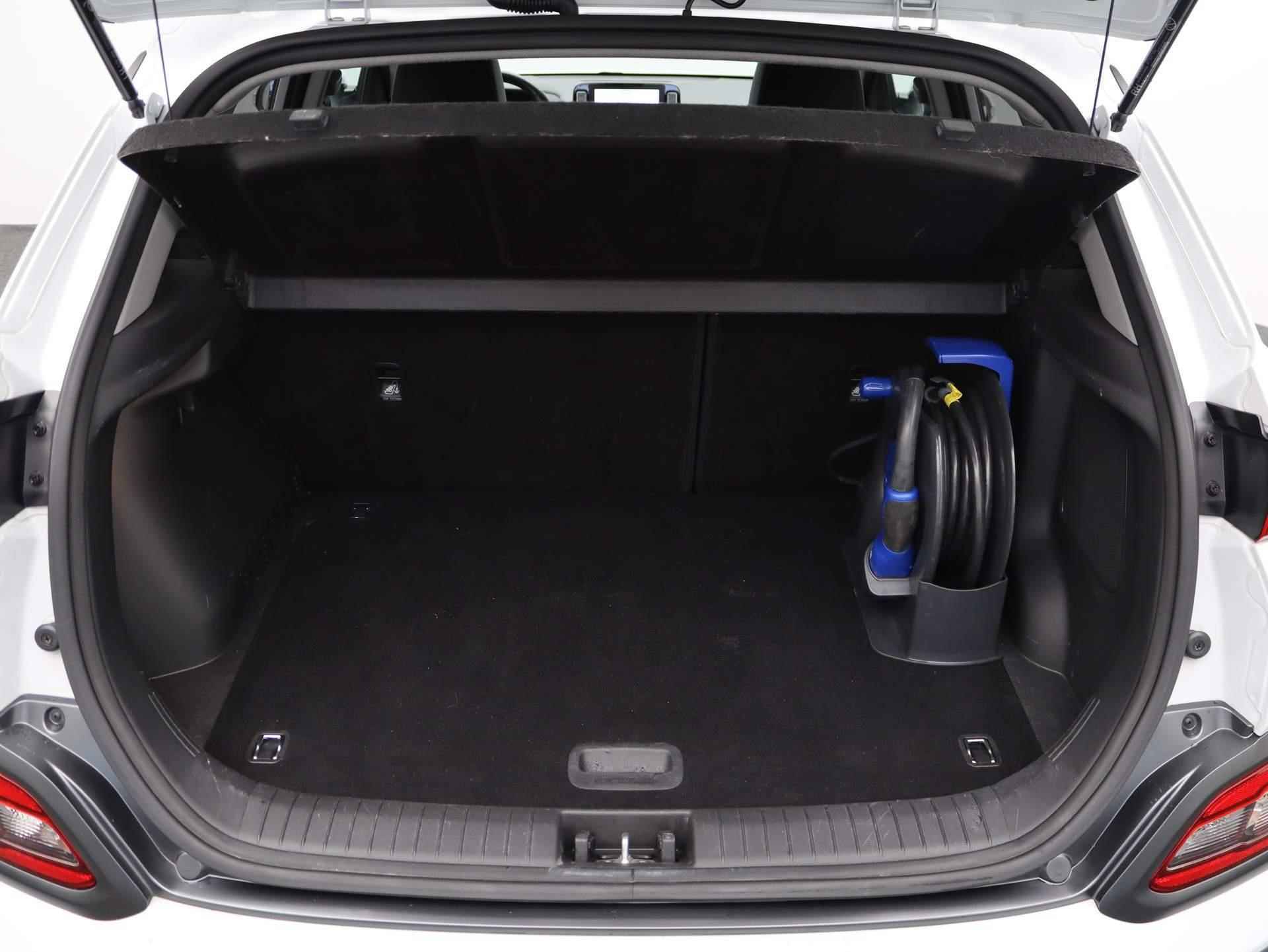 Hyundai Kona EV Premium 64 kWh | Camera | Cruise Control | Navigatie | Stoelverwarming - 31/48