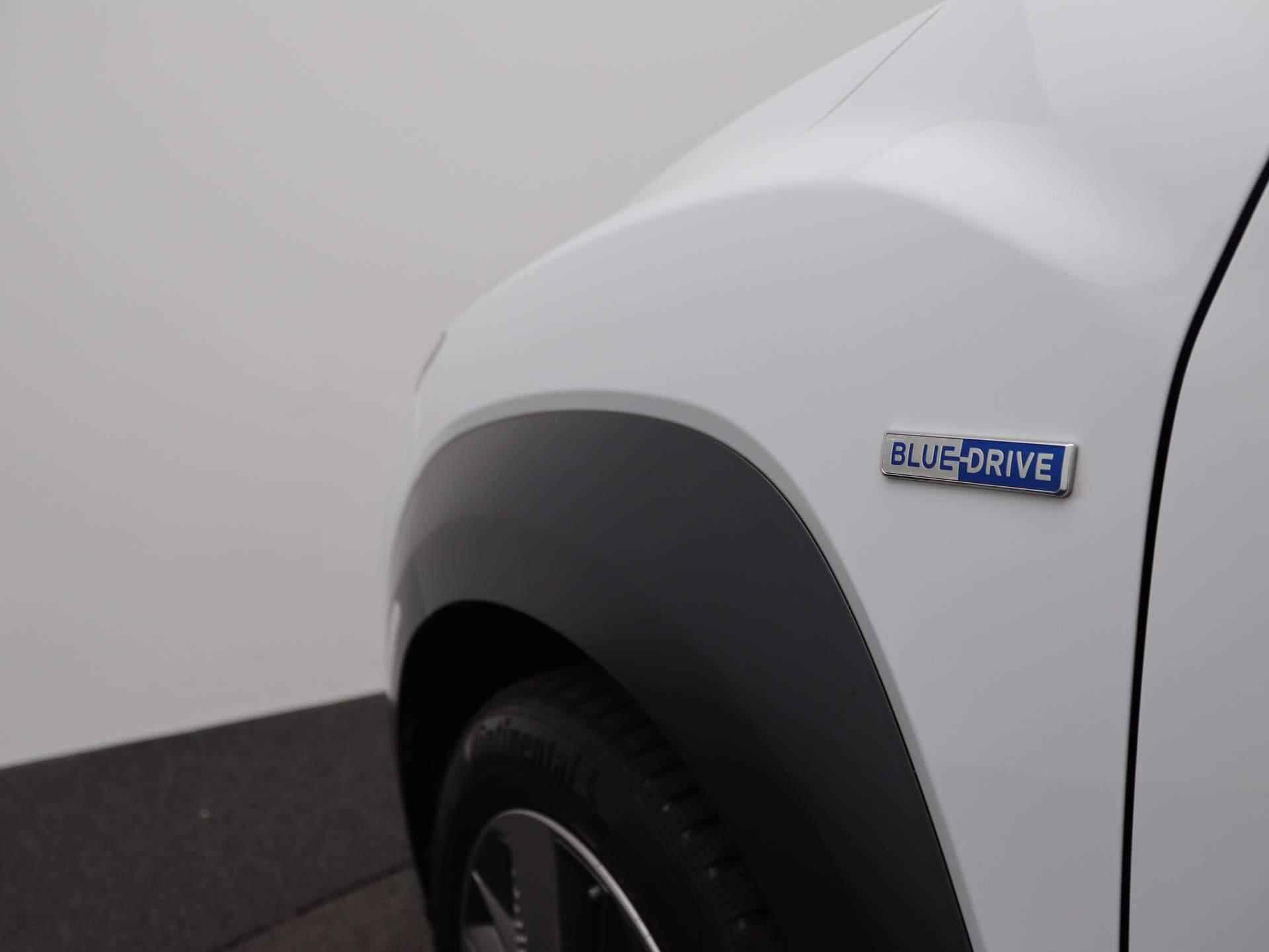 Hyundai Kona EV Premium 64 kWh | Camera | Cruise Control | Navigatie | Stoelverwarming - 34/48