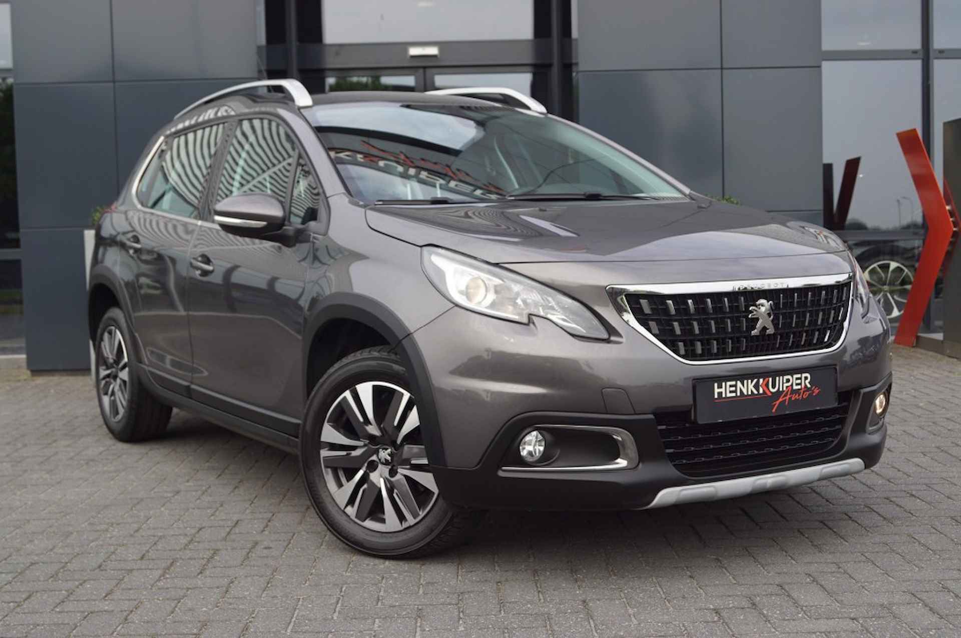 PEUGEOT 2008 1.2 PureTech Allure 110pk / Navi / PDC / DAB - 10/37