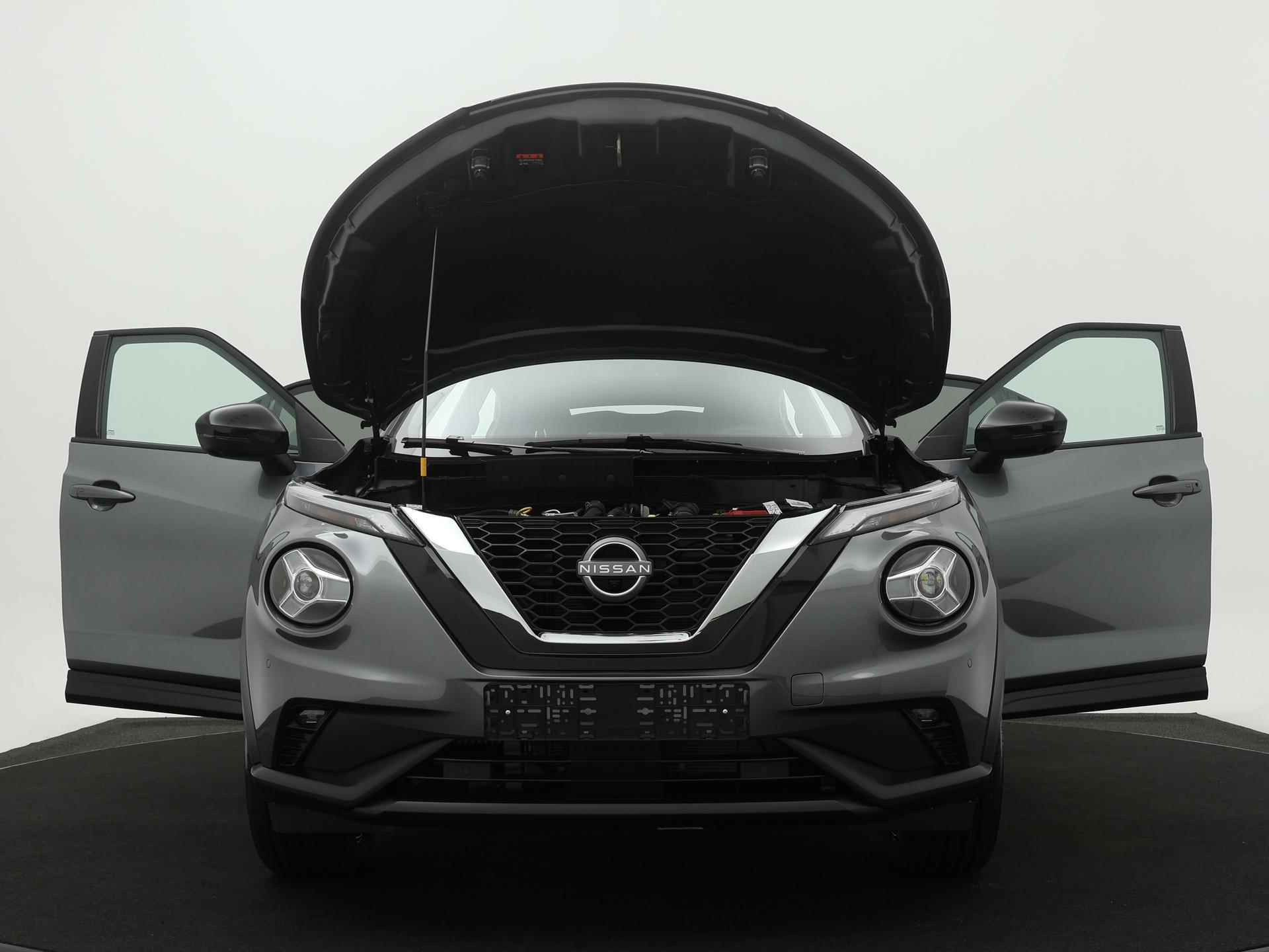 Nissan Juke 1.0 DIG-T Tekna - 27/34