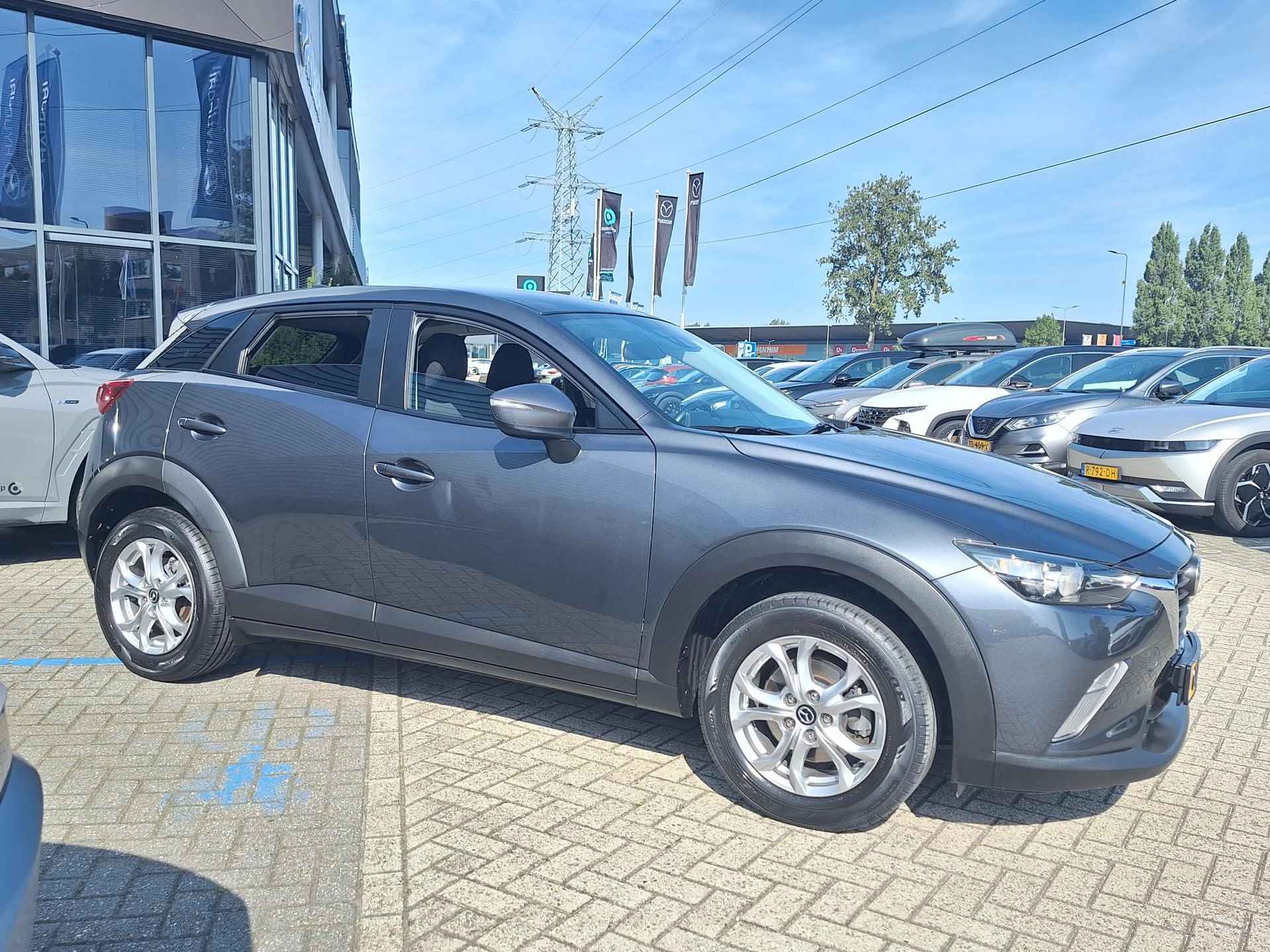 Mazda CX-3 2.0 SkyActiv-G 120 TS+ | Rijklaarprijs! | Climate Control | Navigatie | Cruise Control | Stoelverwarming | Inclusief 12 mnd Bovag Garantie! | - 8/28