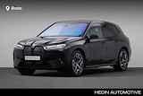 BMW iX xDrive40 Business Edition Plus 77 kWh | Laserlight | Comfort Access | Driving Assistant Professional | Panoramadak | Harman Kardon | Parking Assistant Professional | Stoelventilatie voor beide voorstoelen | Trekhaak elektrisch we