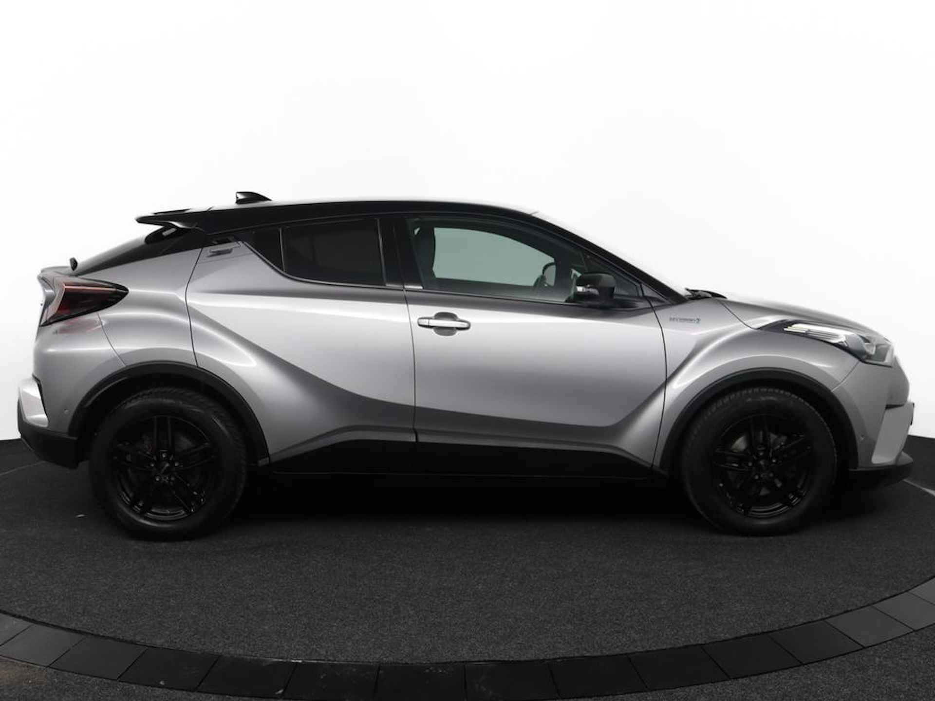 Toyota C-HR 1.8 Hybrid Bi-Tone | Lederen bekleding | Adaptieve cruise control | Stoelverwarming | Stuurverwarming | - 13/78