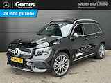 Mercedes-Benz GLB 180 AMG Line | Panoramadak | Multispaaks AMG Velgen | MULTIBEAM LED Koplampen | Verschuifbare Achterstoelen | Sierdelen Lindehout Zwart | Alarm | Sfeerverlichting | Stoelverwarming | Achteruitrijcamera | Showmodel SALE