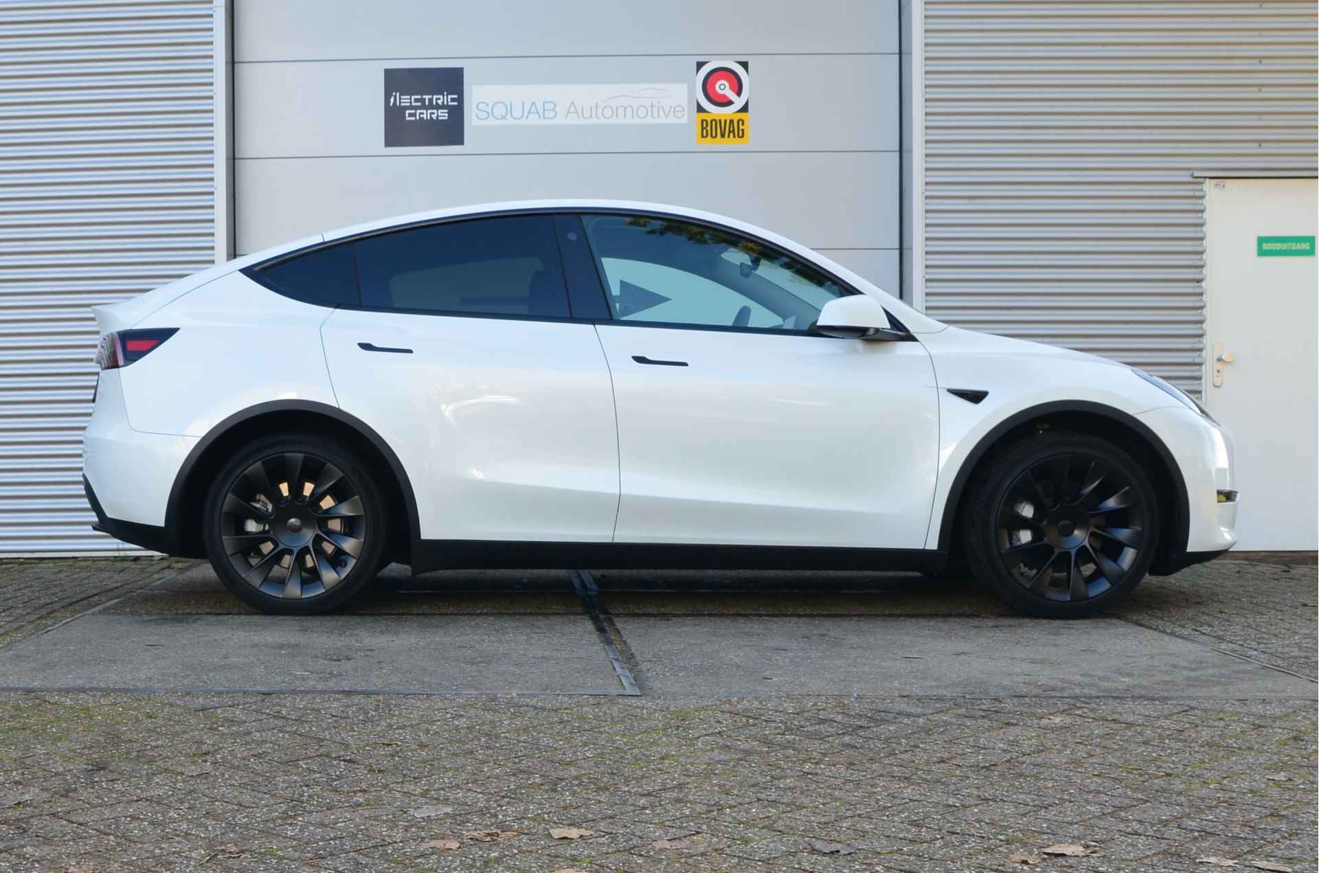 Tesla Model Y Long Range AWD 75 kWh AutoPilot, 20", BTW auto! - 7/34